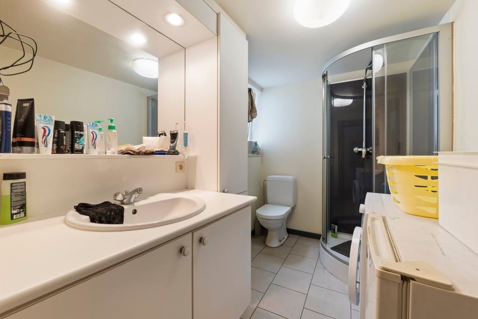 KNAP HANDELSPAND MET TWEE APART VERHUURDE APPARTEMENTEN IN HET CENTRUM VAN SINT-TRUIDEN foto 26