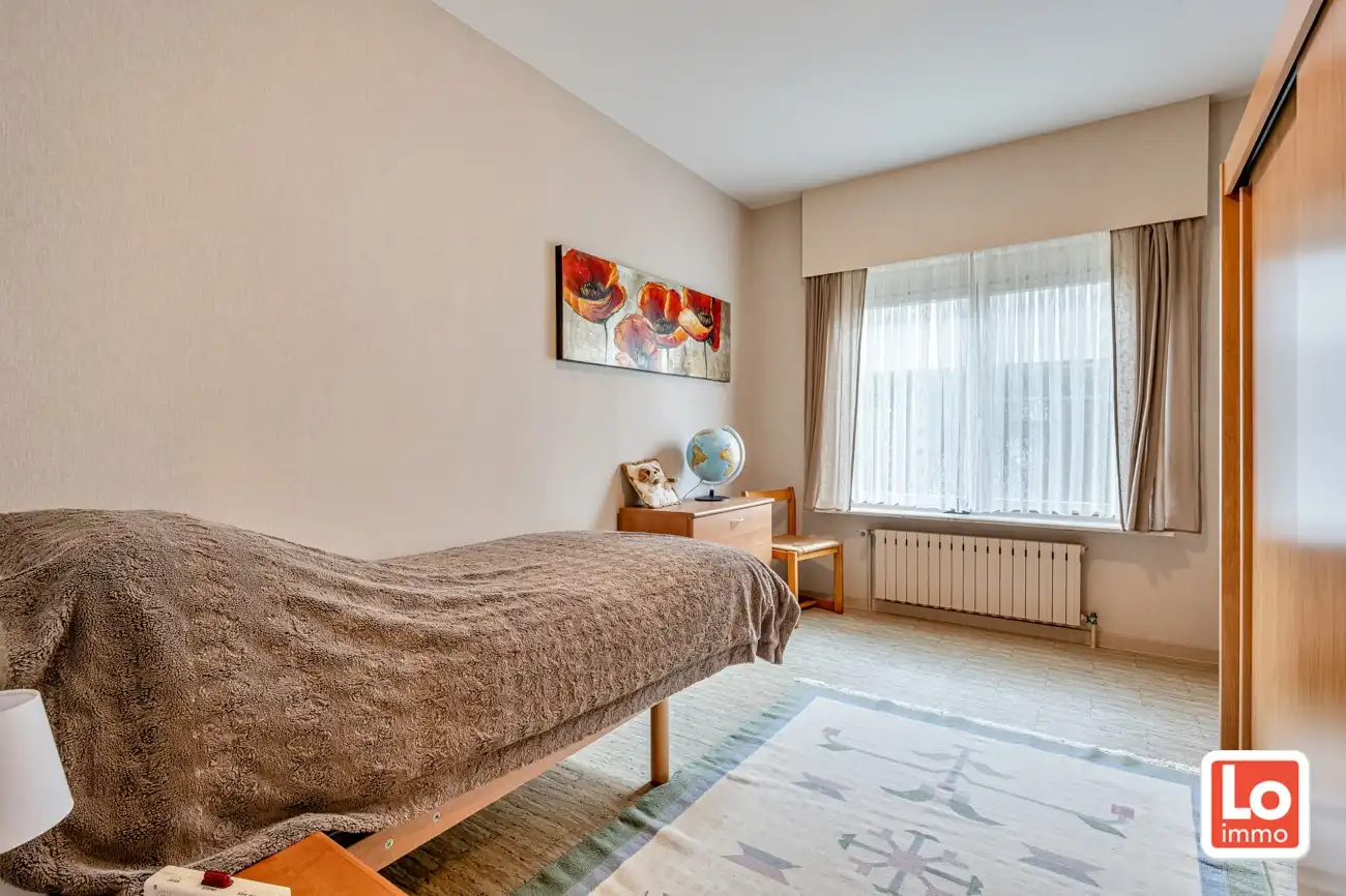 Degelijke open gelijkvloerse woning met inpandige garage en grote tuin op een groene toplocatie in Beervelde! foto 21