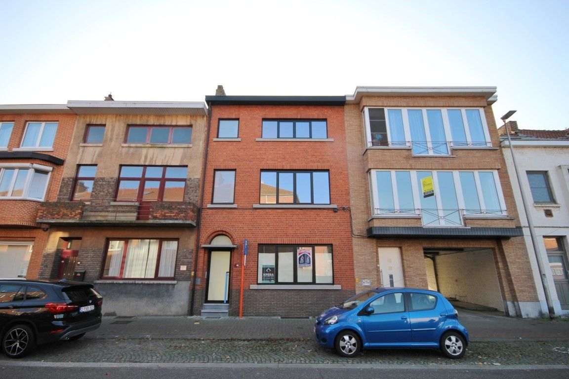 Modern vernieuwd gelijkvloers appartement met 1 slaapkamer en ruime tuin foto {{pictureIndex}}