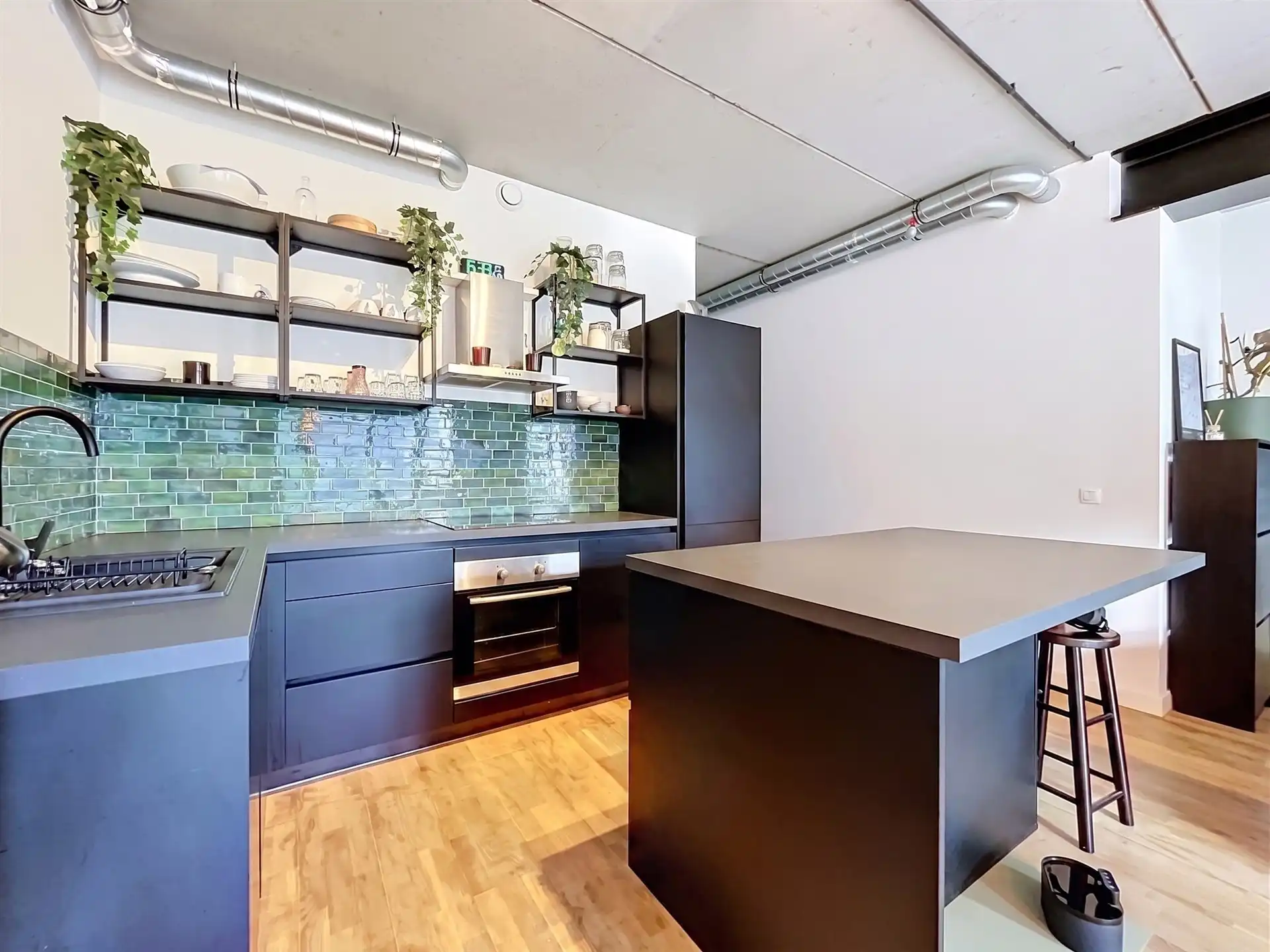 Modern gelijkvloers appartement met tuin van 200m²! foto 4