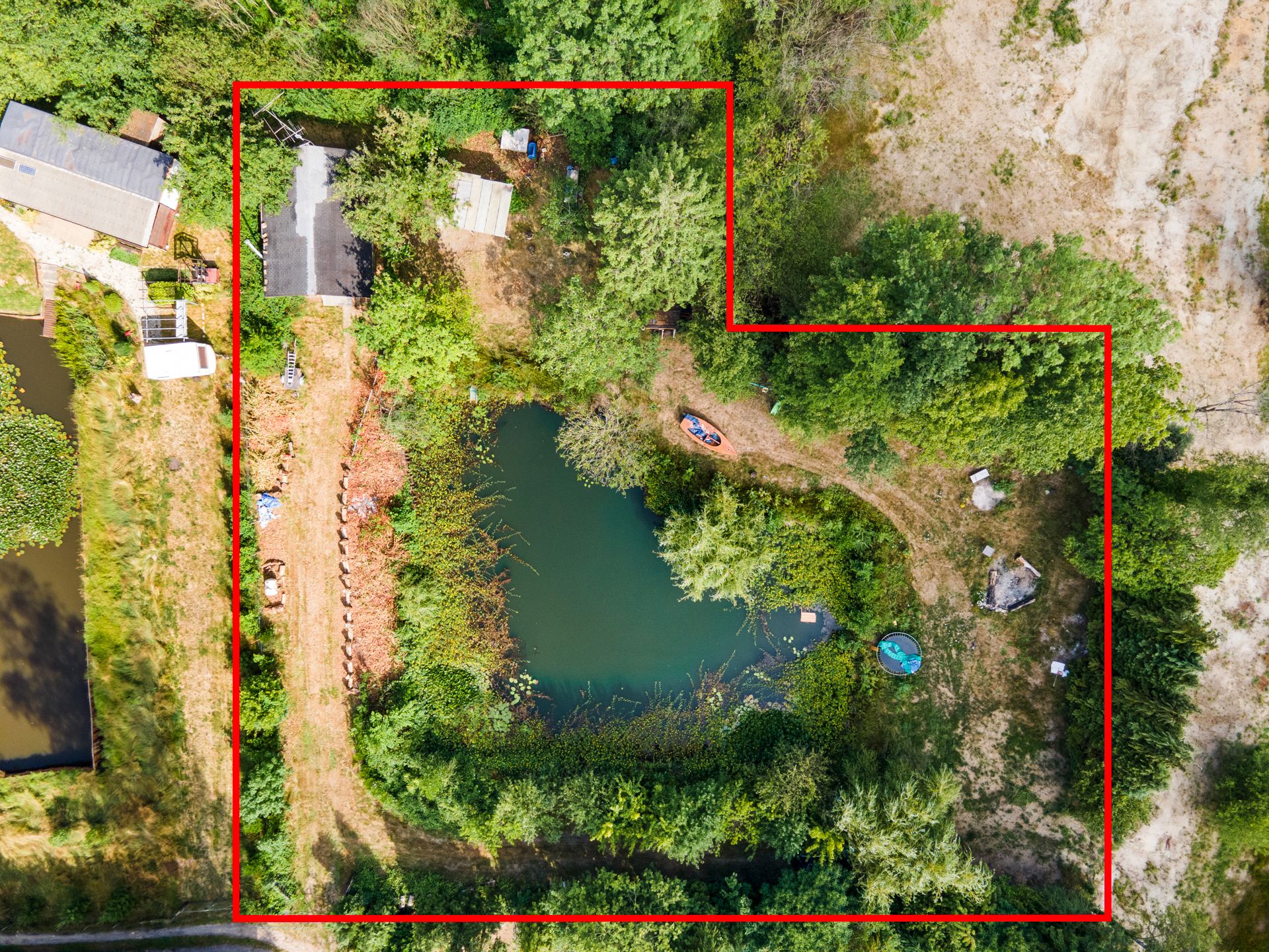 Hoofdfoto van de publicatie: Chalet met 2 slpks op 2.710 m² recreatiegrond in Vorselaar.