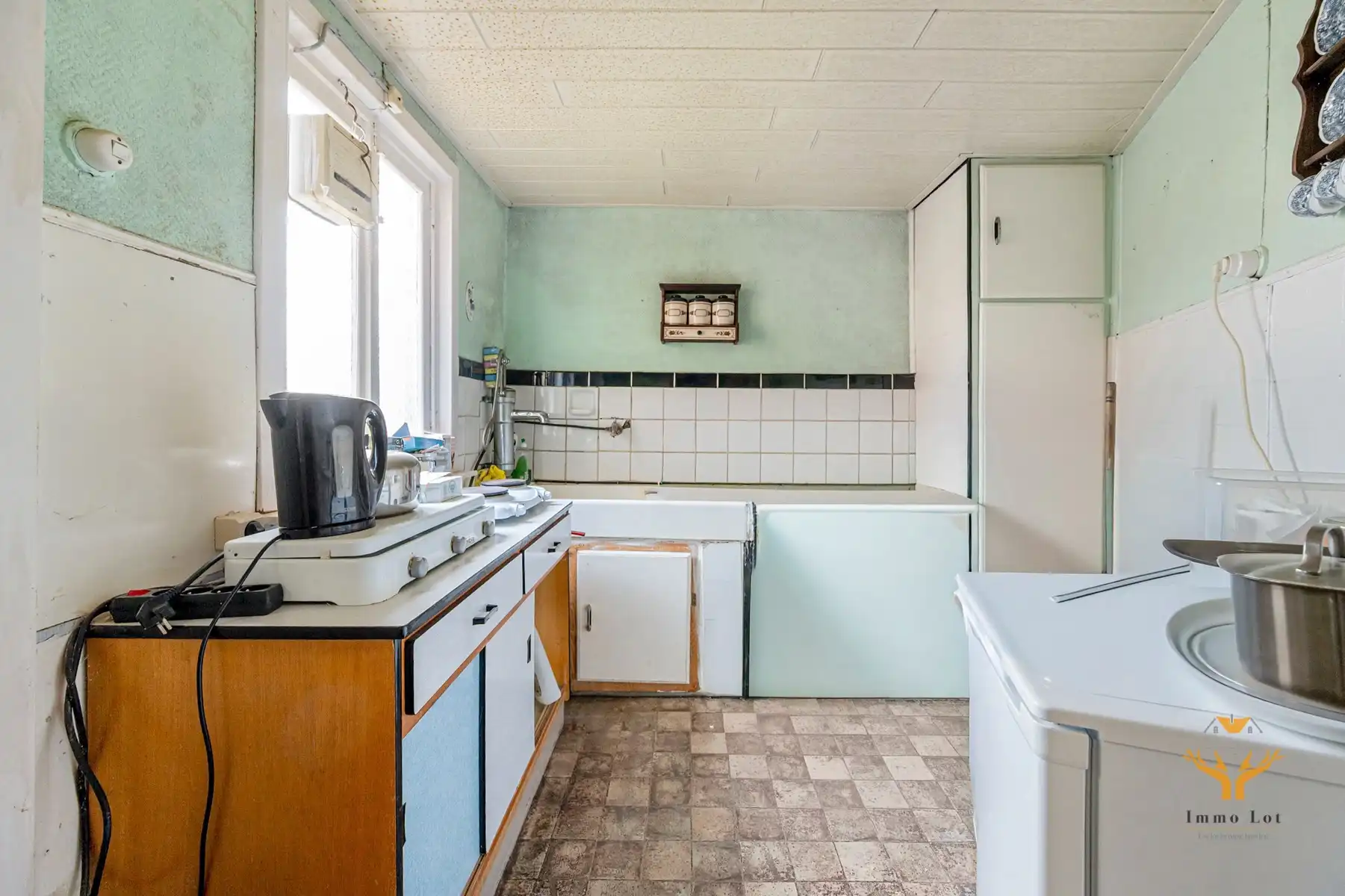 Ideale te renoveren starterswoning in hartje Berlare foto 9