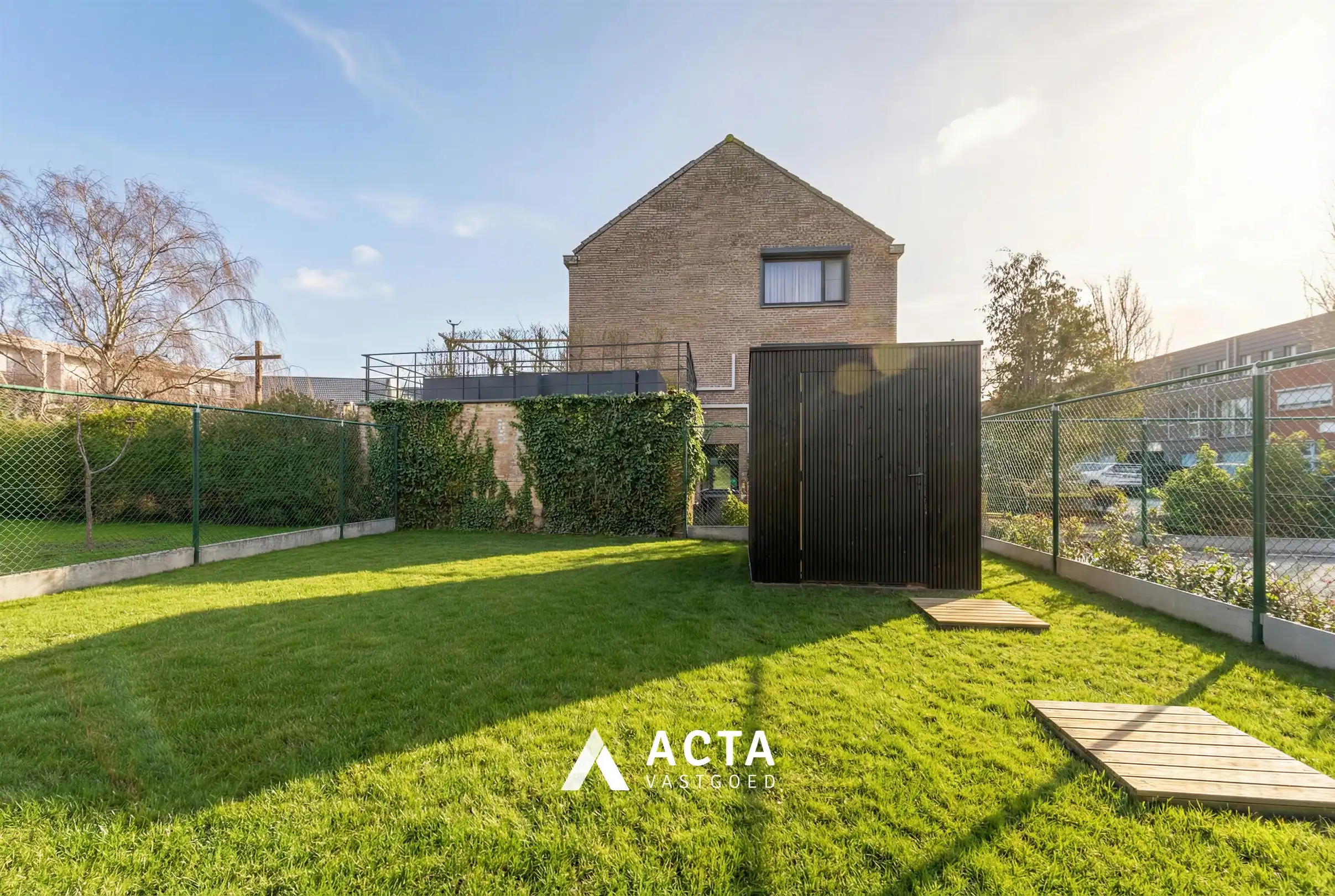 Nieuwbouwwoning met drie slaapkamers en tuin in hartje Mariakerke! foto 14