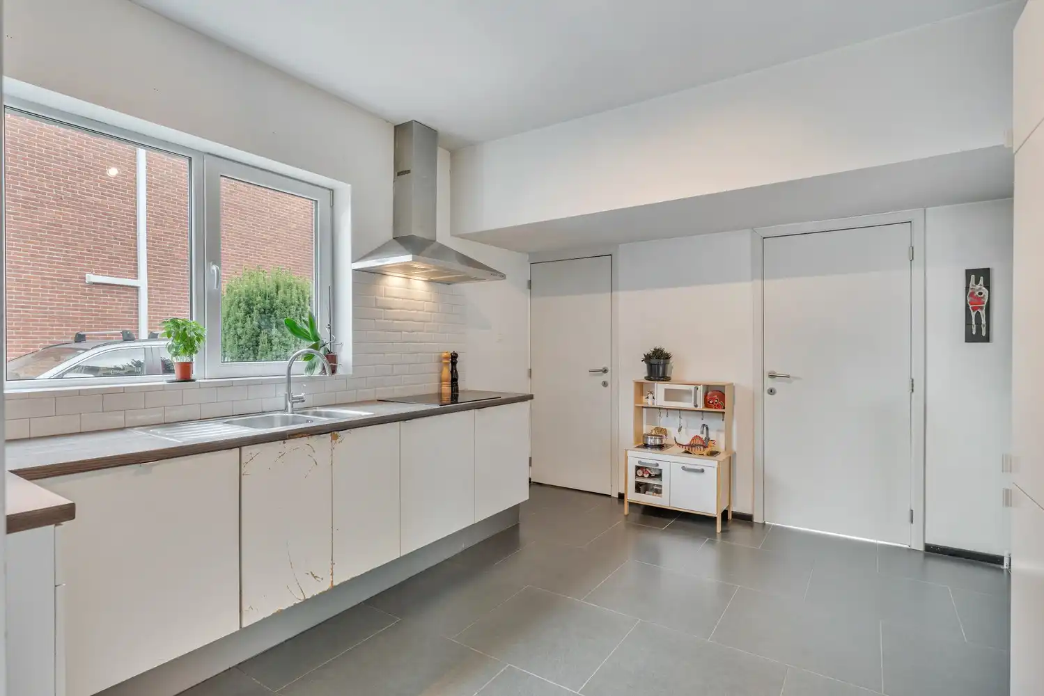 Goed gelegen, vrijstaande en lichtrijke woning met een oprit met een garage, 3 slaapkamers en een diepe tuin te Wilsele! foto 12