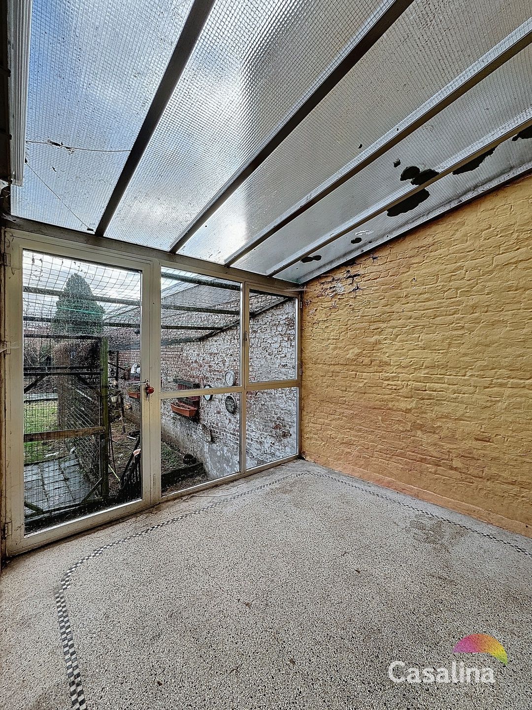 ONDER OPTIE - Huis te renoveren met een tuin van 250m² foto 9