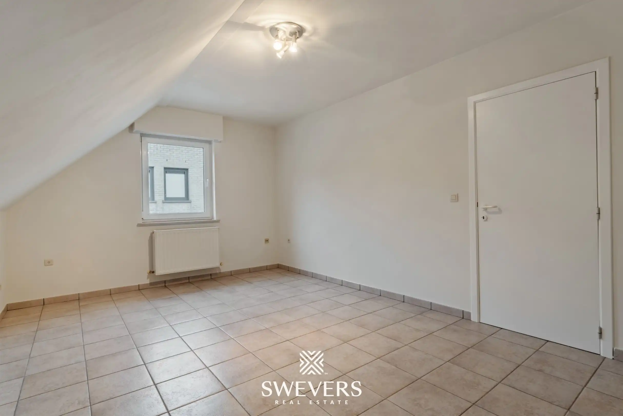 Ruim duplex appartement met 2 slaapkamers, terras en garage in Heusden-Zolder foto 10