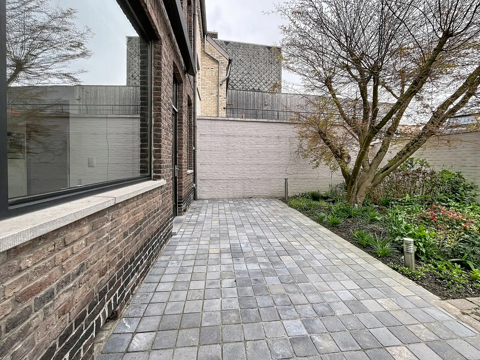 Authentieke woning met 2 slaapkamers in centrum Bree.  foto 21