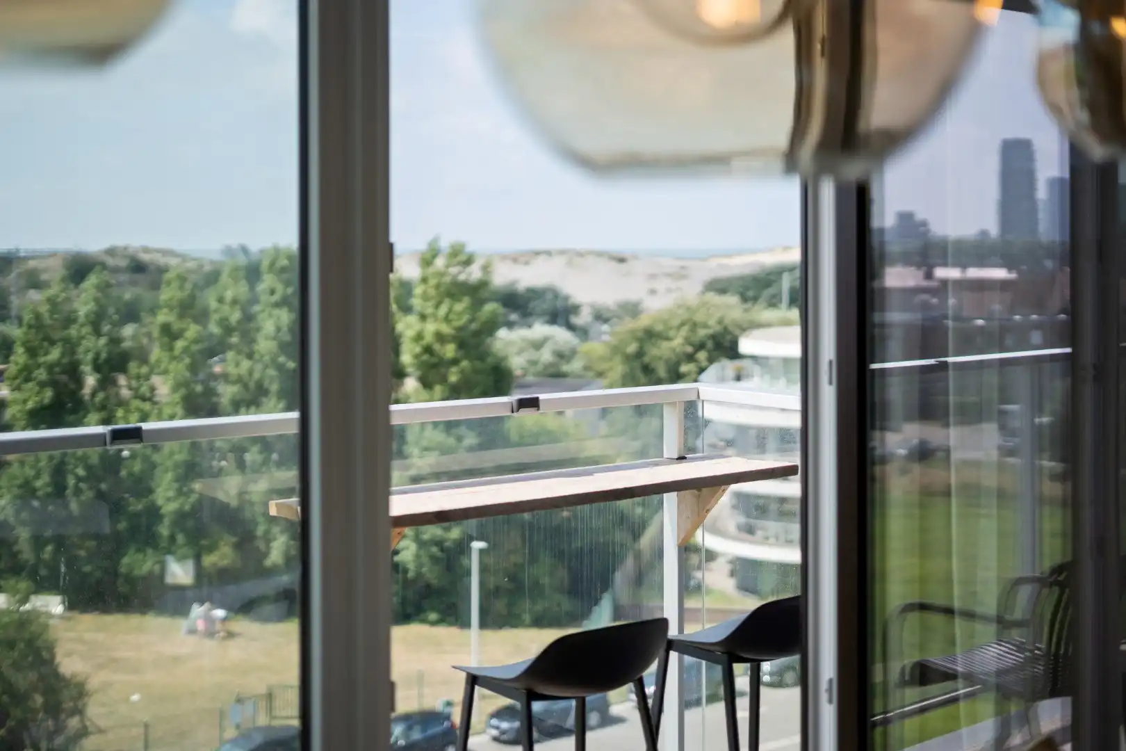 Instapklaar gemeubeld 2-slaapkamerappartement met zeezicht en duinenzicht te Bredene  foto 24