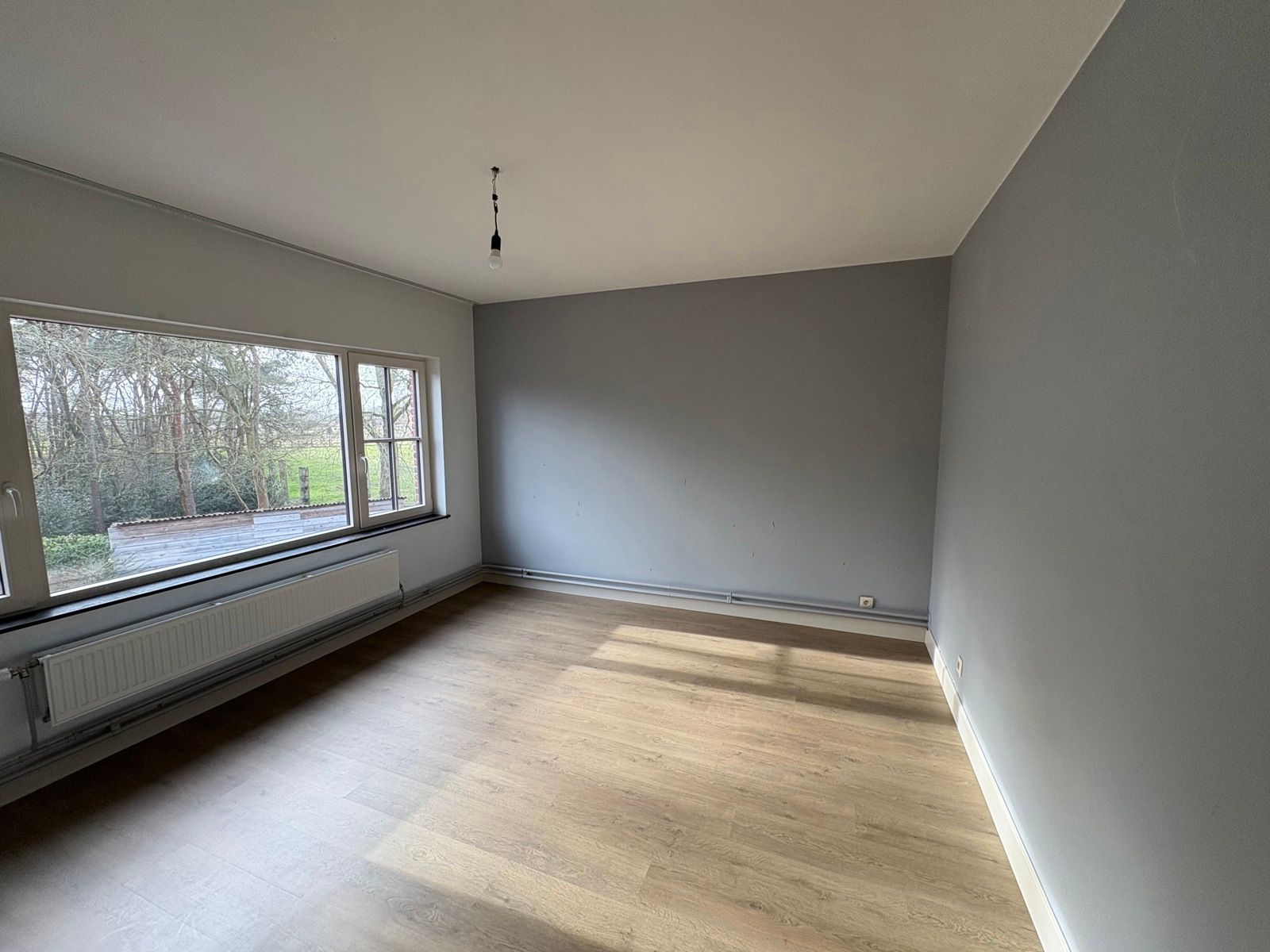 Open bebouwing met 3 slaapkamers, tuin en inpandige garage.  foto 7