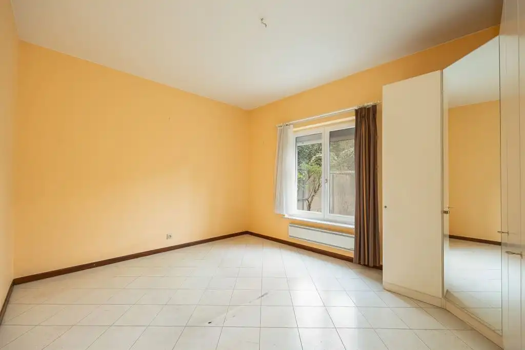 Gelijkvloers appartement met tuin en autostaanplaats foto 11