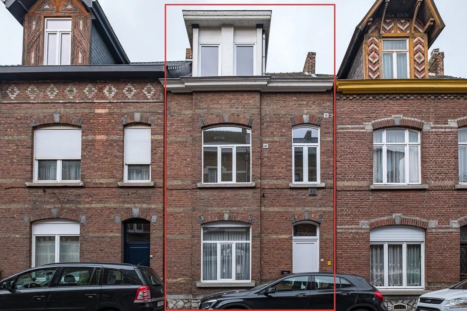 Rijwoning te koop nabij centrum foto 2