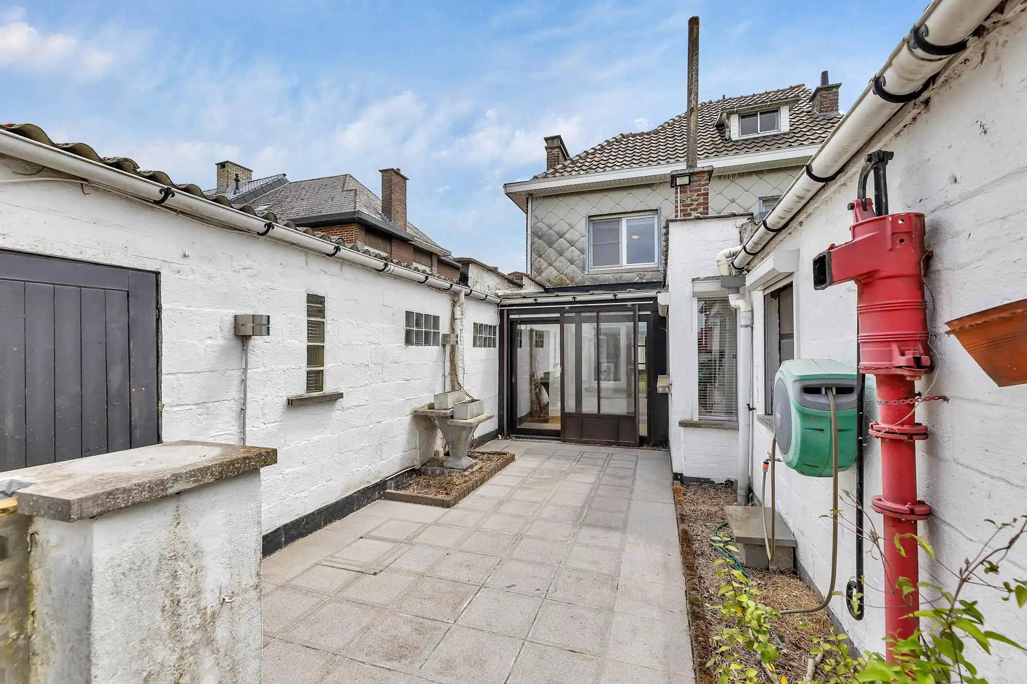 Goed onderhouden woning met garage en tuin foto 30