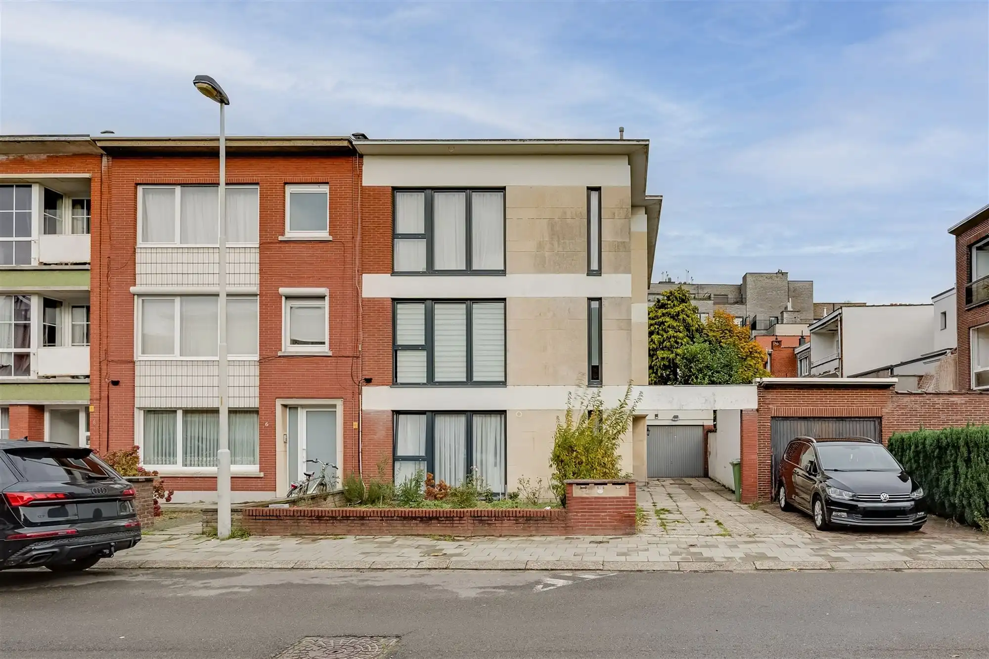Vergund betonnen opbrengsteigendom met 3 appartementen + garagebox foto 23