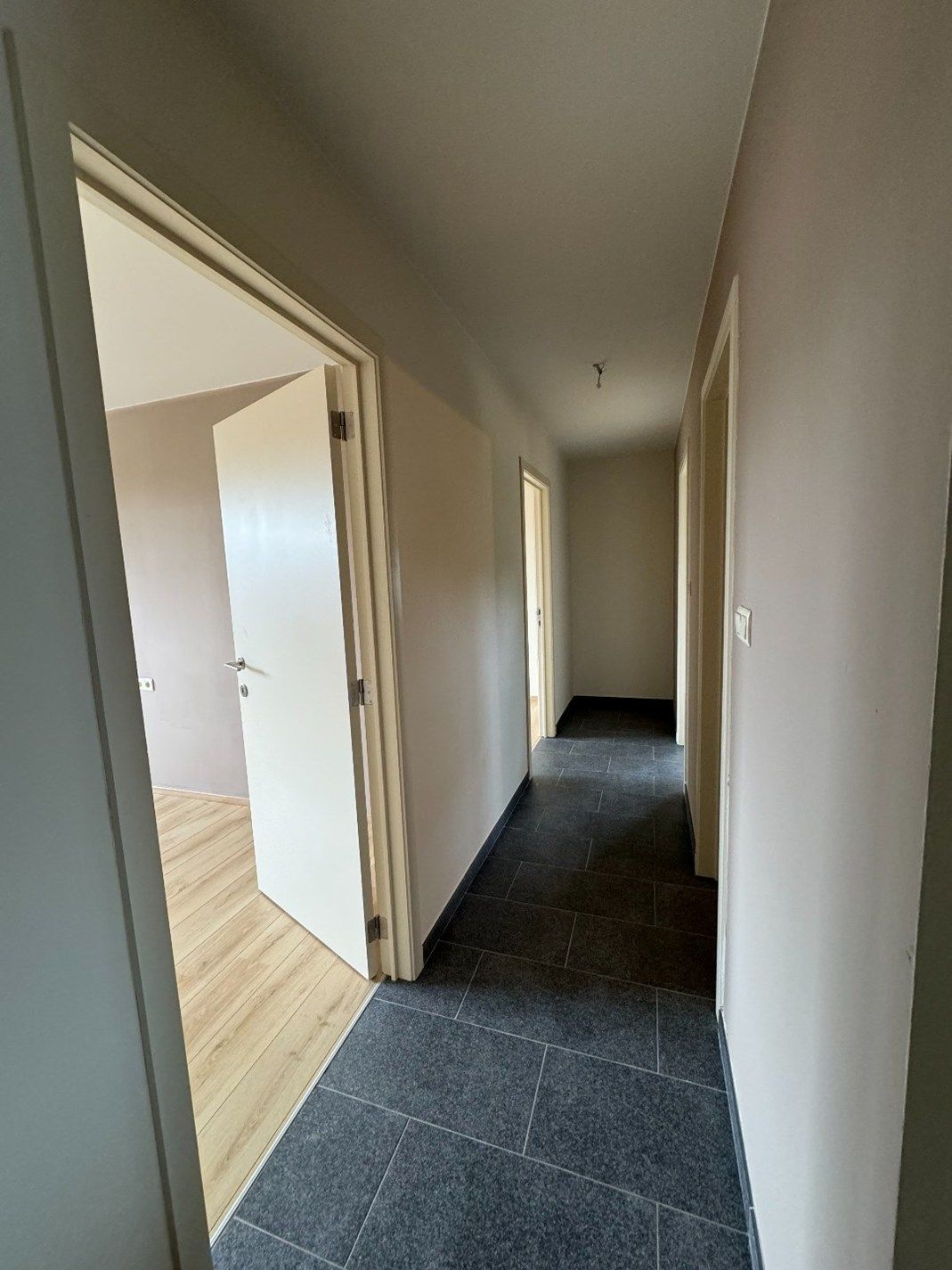 Duplex appartement met 3 slaapkamers en 2 autostaanplaatsen in hartje Beringen foto 10