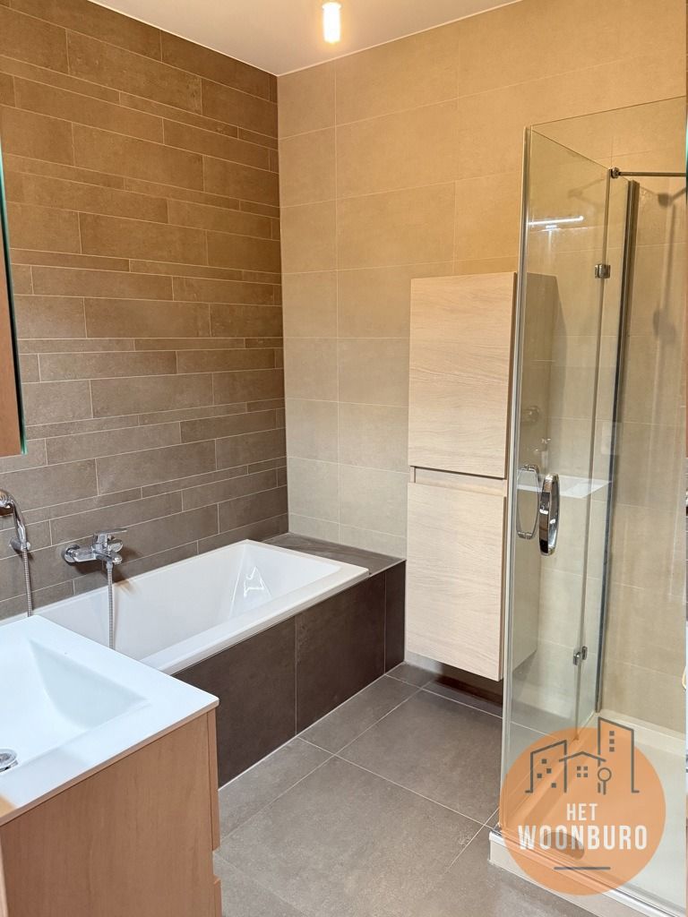 Appartement 1ste verd. met 2 slpks, ruime kelder en garage foto 6