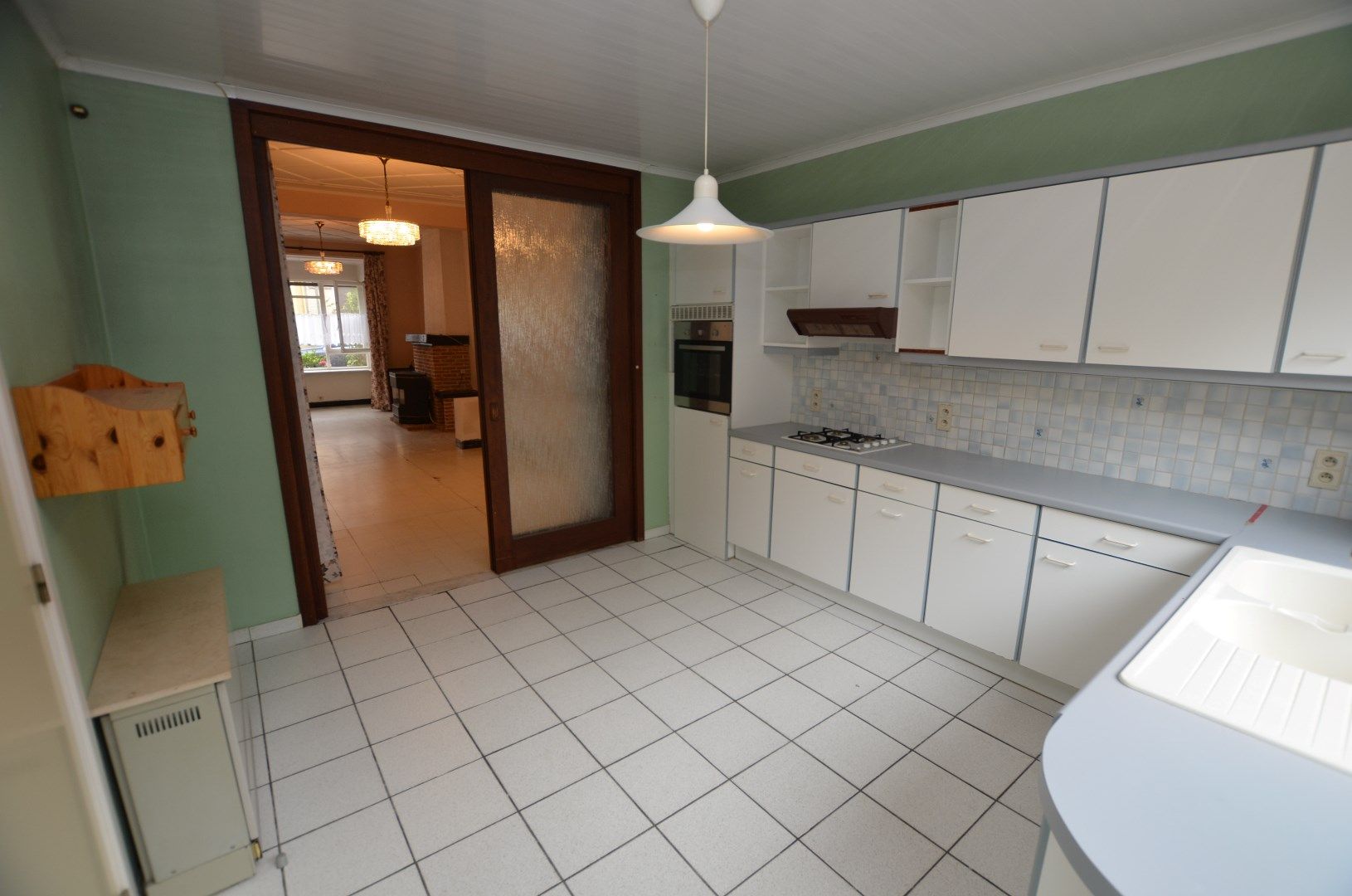 Te renoveren karaktervolle ruime woning met zonnige tuin foto 5