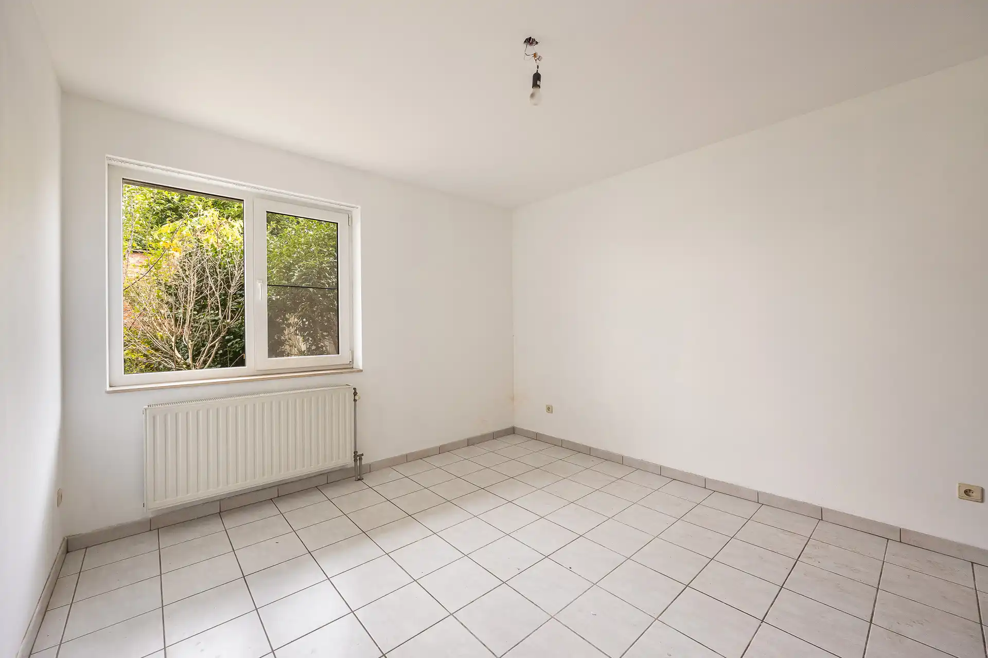 Gelijkvloers appartement met garage en tuin in Hemiksem foto 10