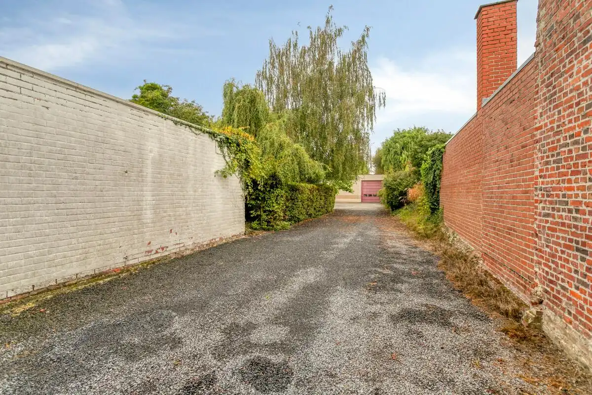 Magazijn van circa 1.285 m² met woning te koop in Bellegem foto 15