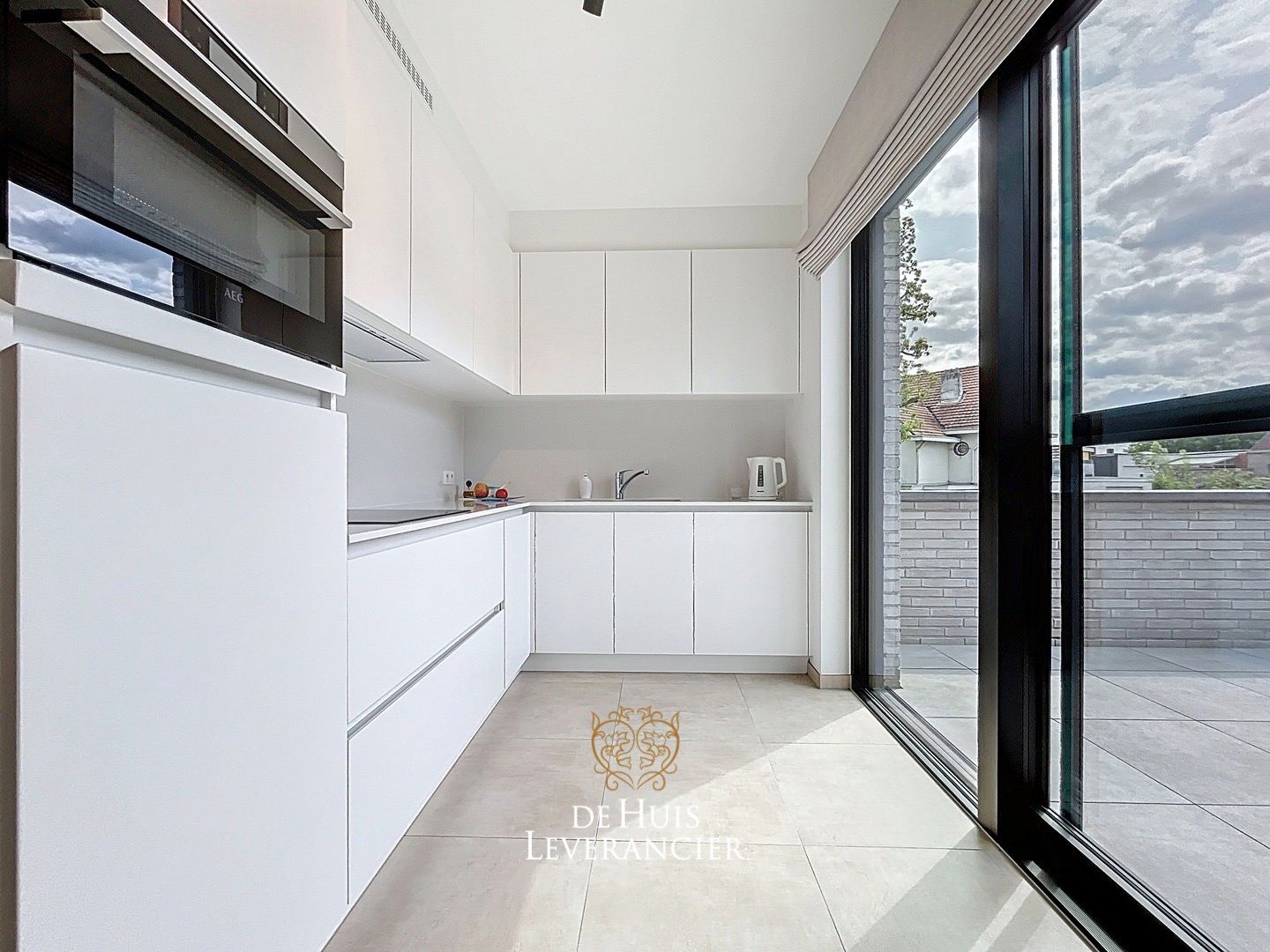 Discrete luxe & tijdloze elegantie : subliem nieuwbouwappartement met terras en gemeenschappelijk tuin te koop in Boechout foto 23