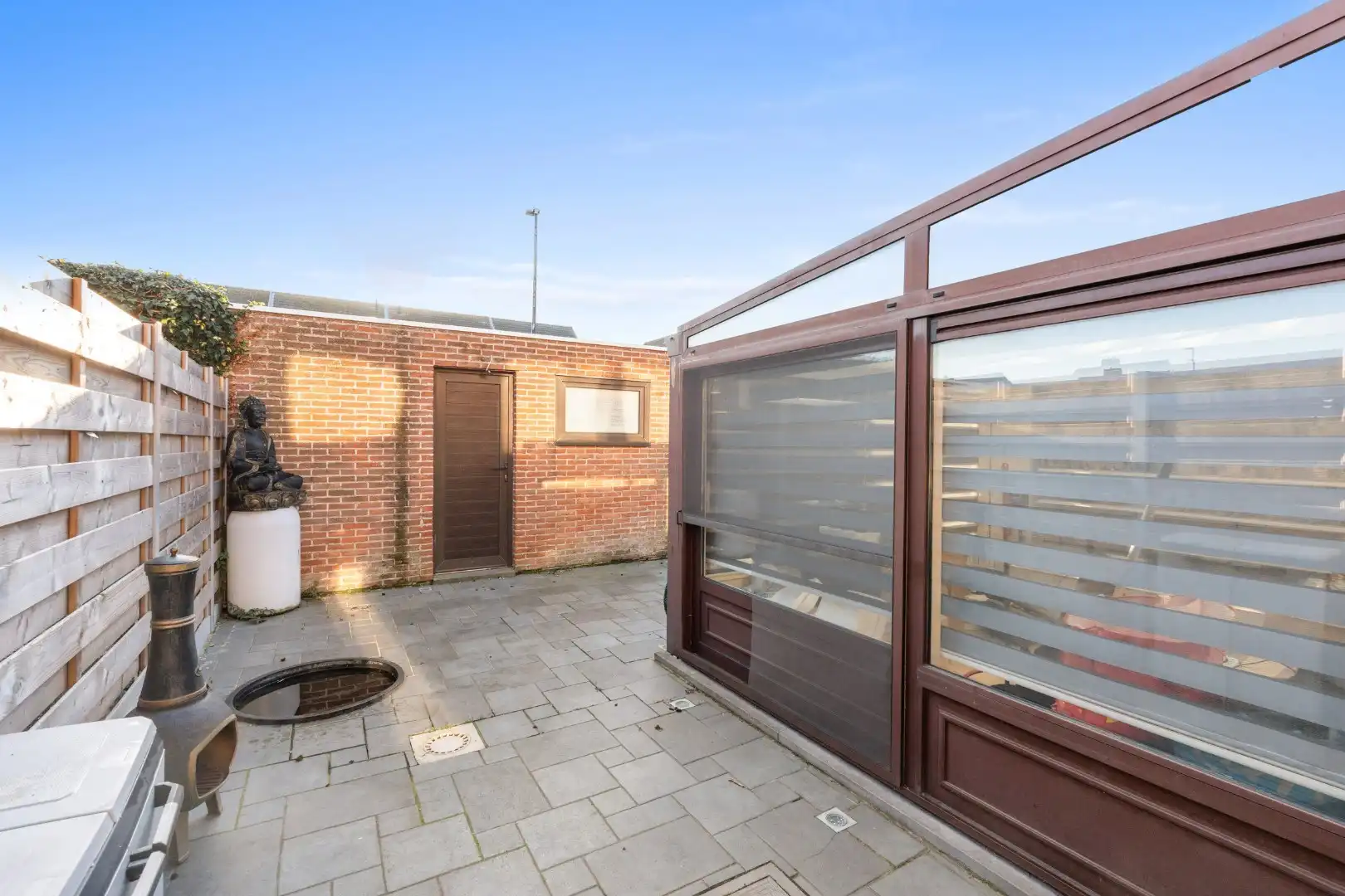 Charmante rijwoning met zonnig terras, wellnessruimte en garagebox in de Vicognewijk foto 19