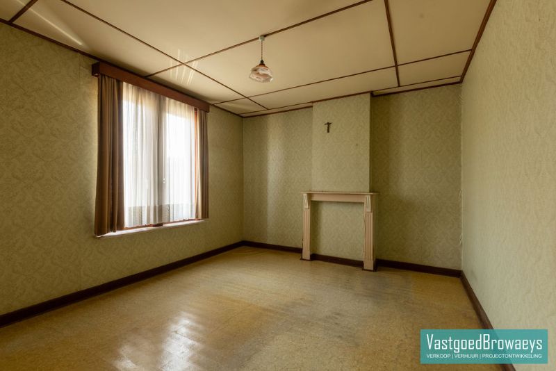 Te renoveren woning met tuin foto 17