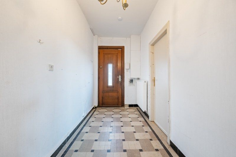 Te renoveren woning met een ruime tuin en zolder – een unieke kans! foto 2