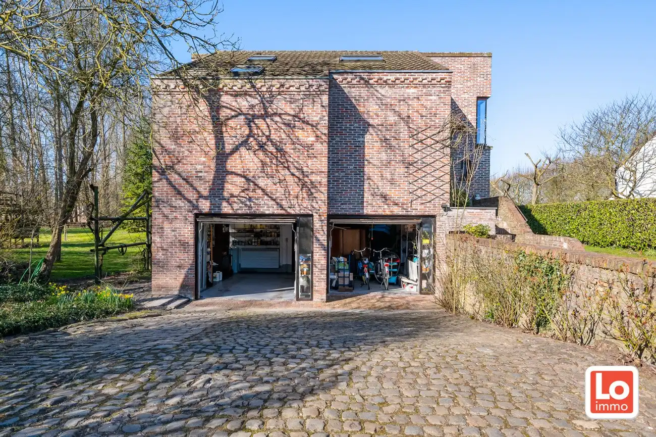 VERKOCHT! Charmante alleenstaande woning met inpandige dubbele garage en grote tuin met aanpalend bos (1ha) op een rustige locatie nabij het centrum van Wachtebeke! foto 20