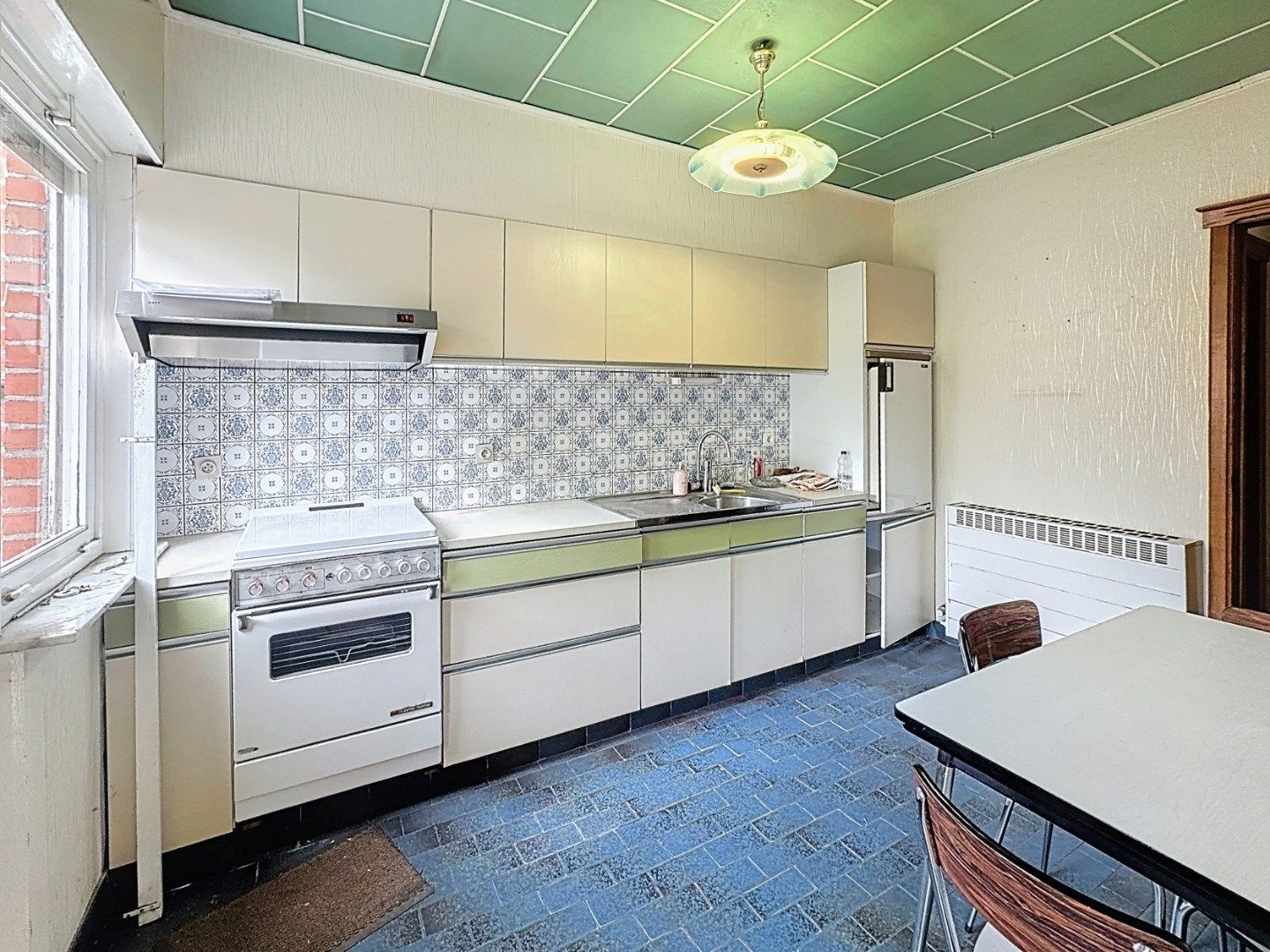 Te renoveren woning op afgesloten perceel van 936m² foto 9