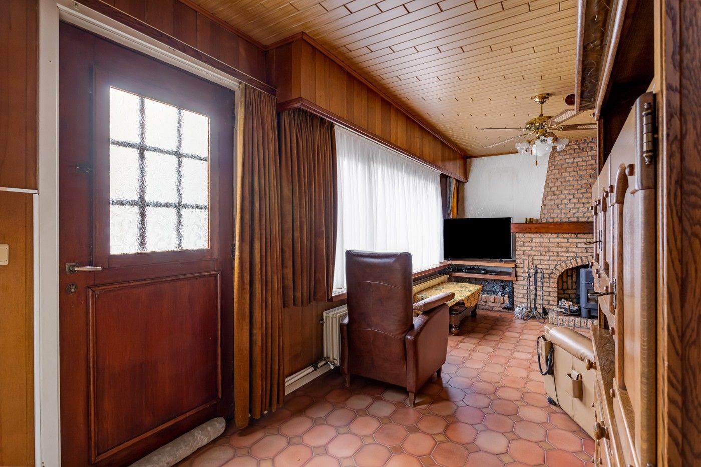 Rustig gelegen woning met 2 slpk., atelier, tuin en dubbele garagebox foto 3
