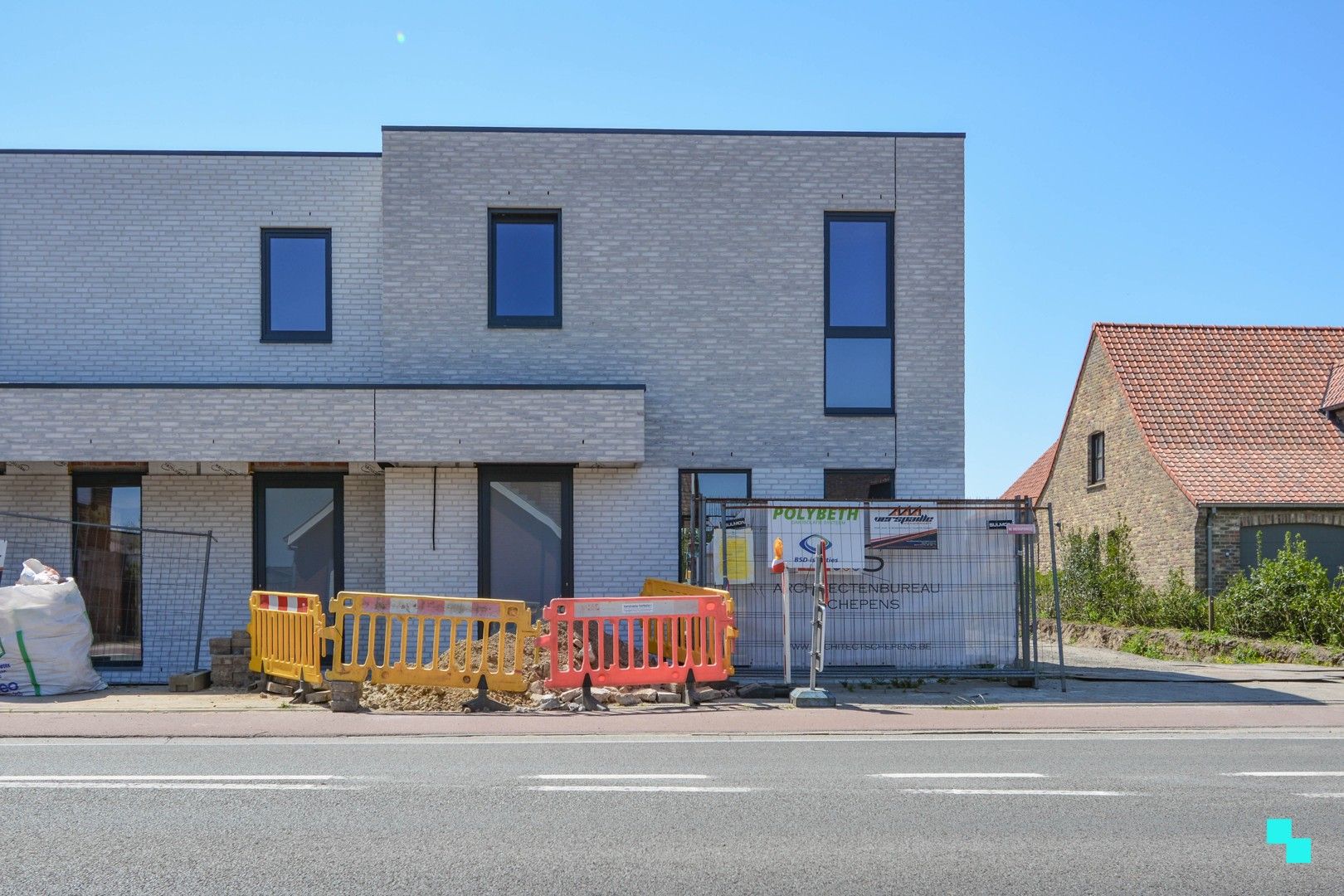 Halfopen nieuwbouwwoning met carport te Sleihage foto {{pictureIndex}}