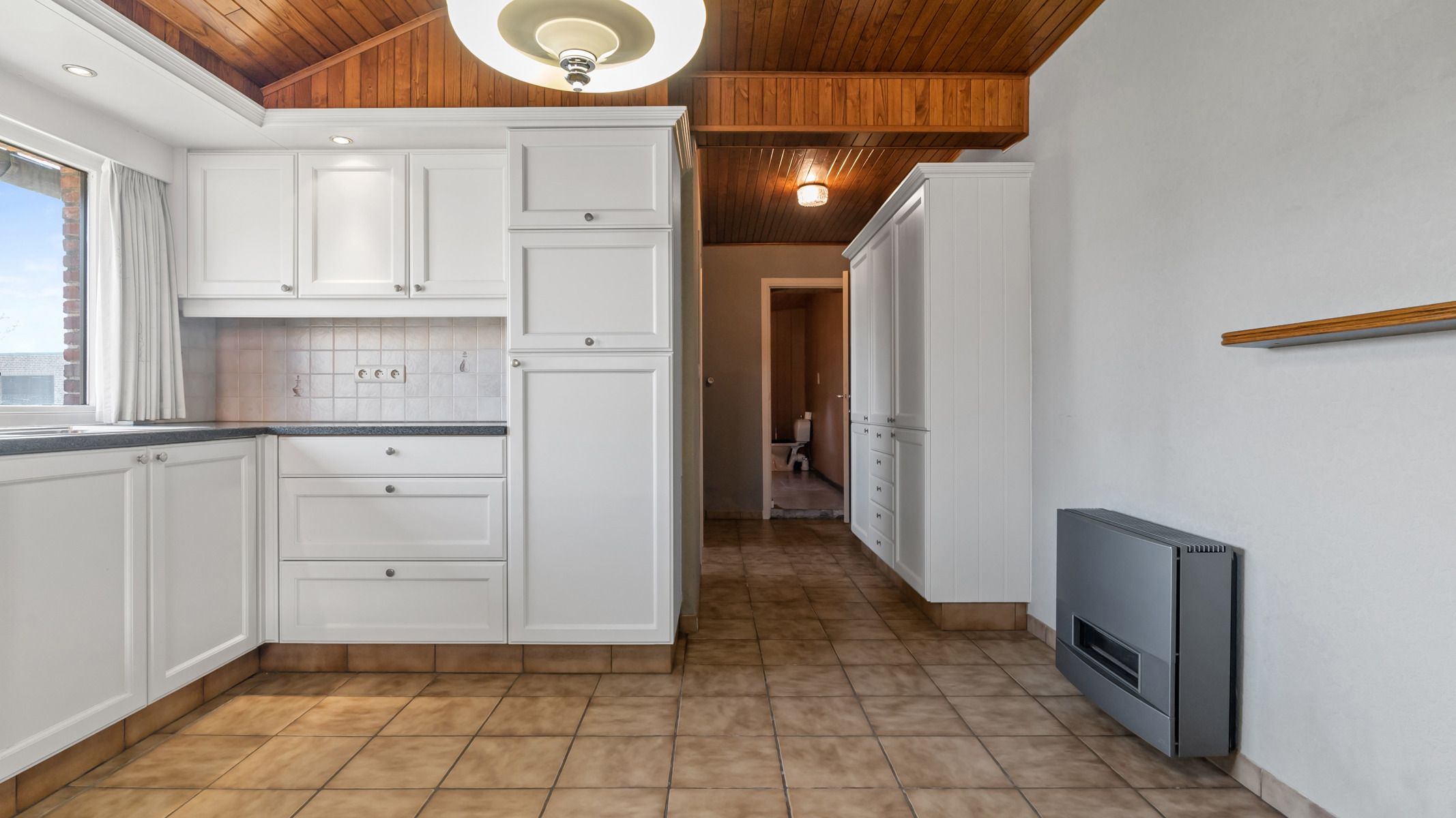 Te renoveren woning met vrij zicht over weilanden foto 8
