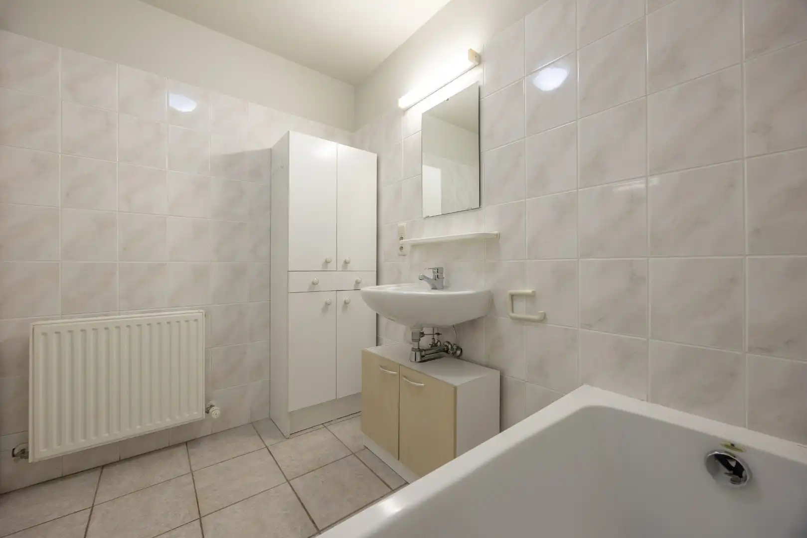 Ruim gelijkvloers appartement met terras en 2 slaapkamers te Overpelt centrum. foto 15