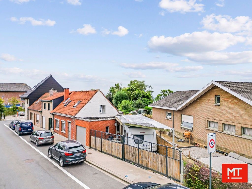 Halfopen woning in de dorpskern van Beselare foto 17