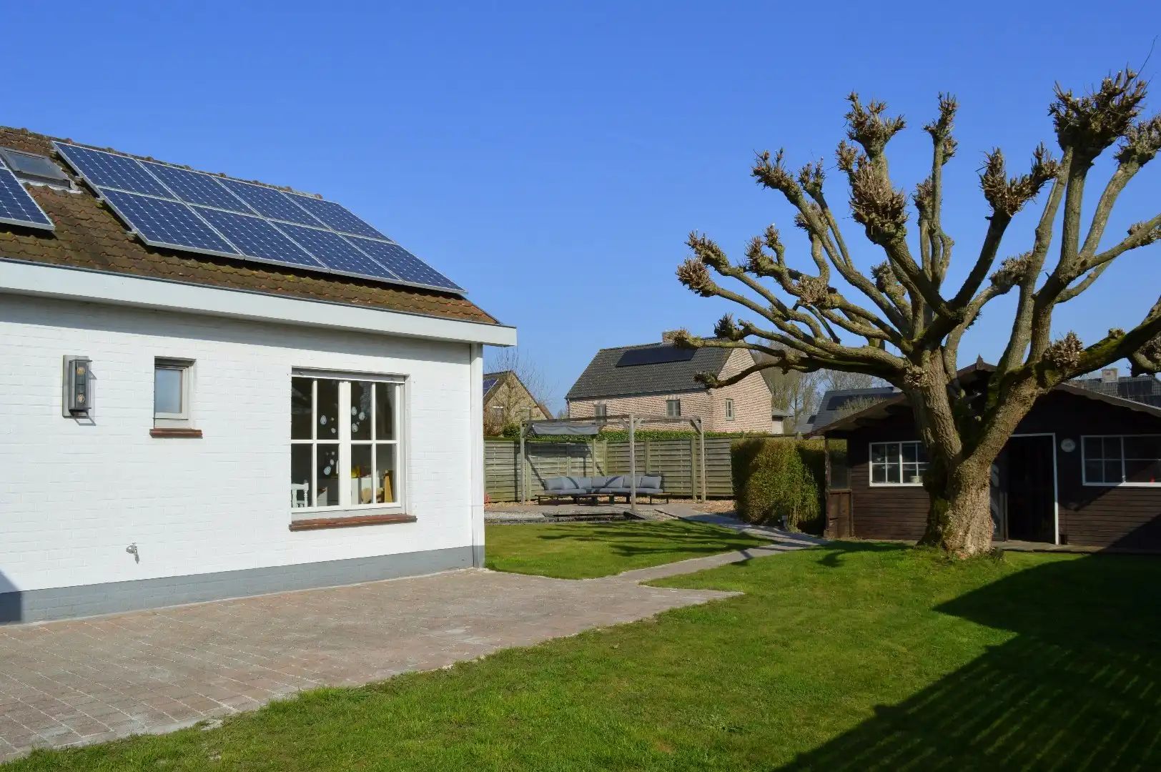 Instapklare woning met 3 slaapkamers, garage en een mooi stukje tuin te koop in residentiële wijk te Aalbeke foto 18