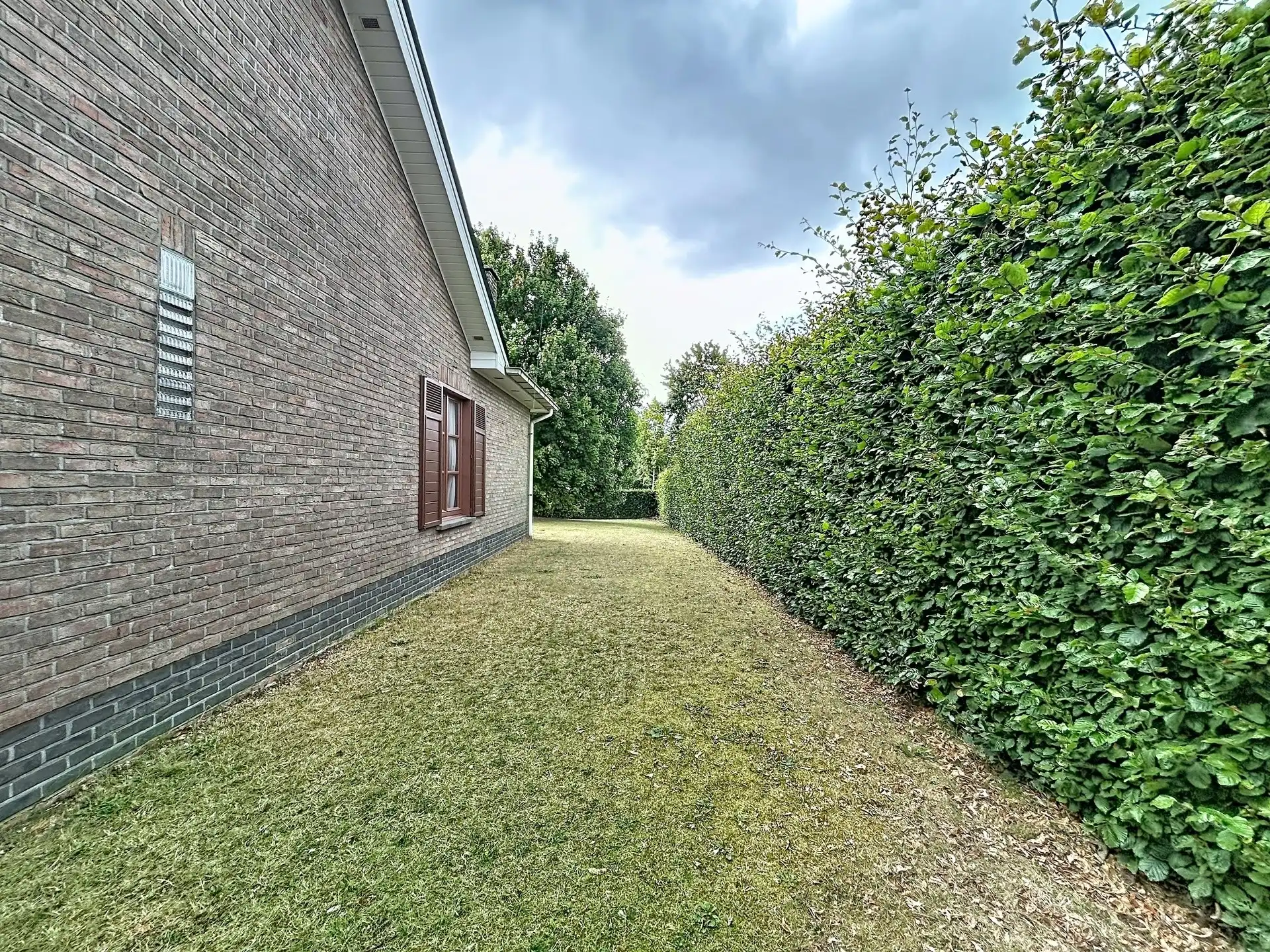open bebouwing met 3 slaapkamers en garage op perceel van 1808m² foto 18