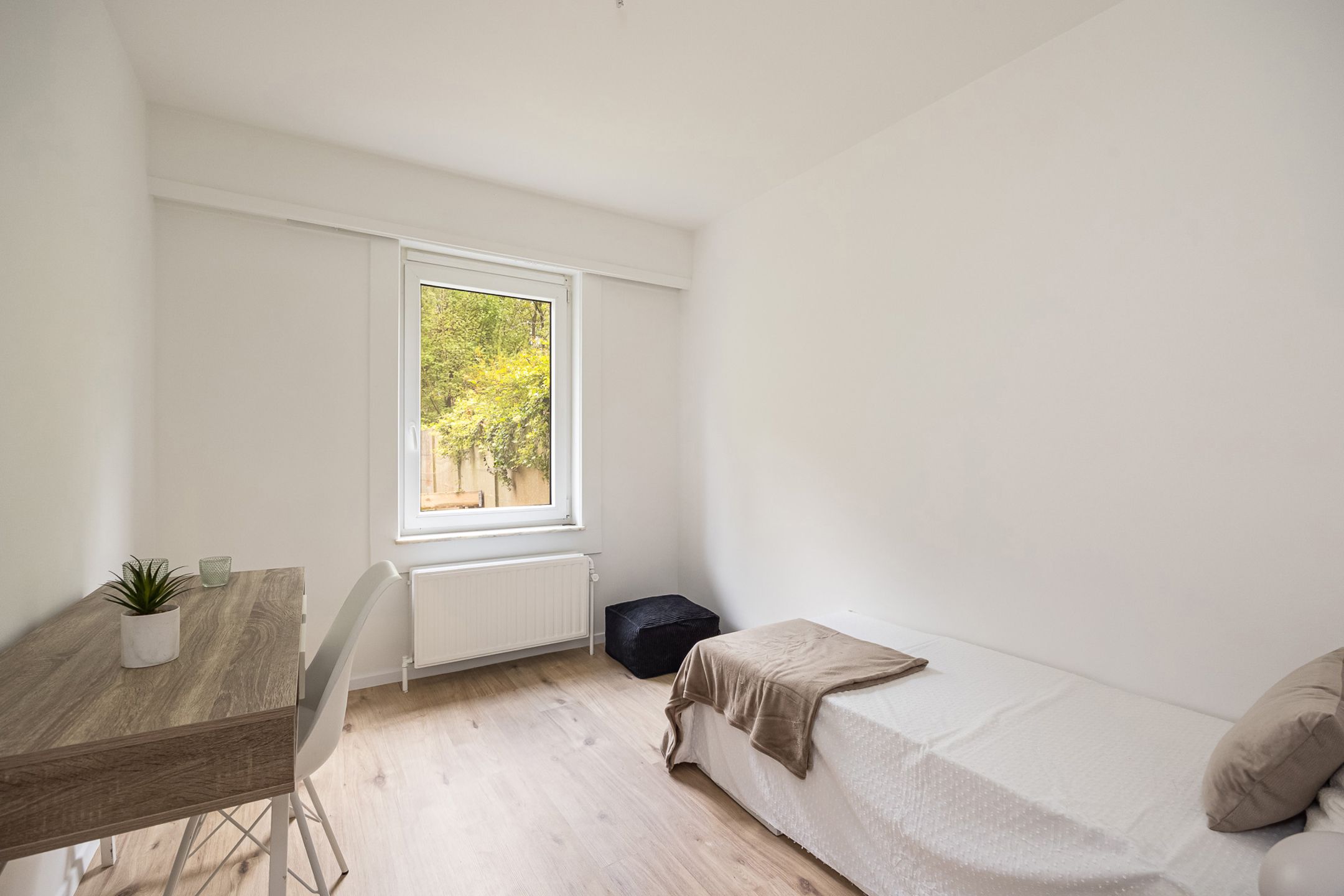 Gerenoveerd gelijkvloers appartement met tuin foto 18