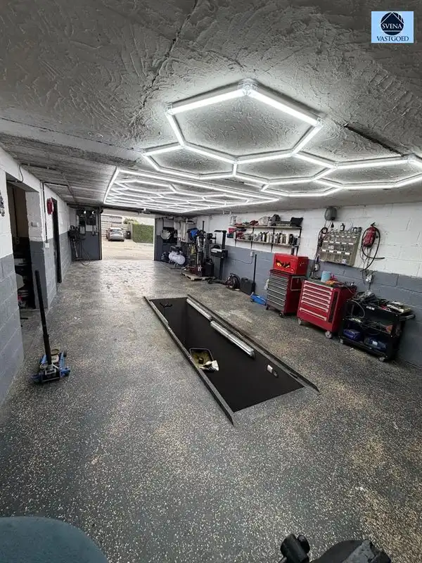 WONING MET HANDELSRUIMTE EN 3 SLAAPKAMERS foto 13