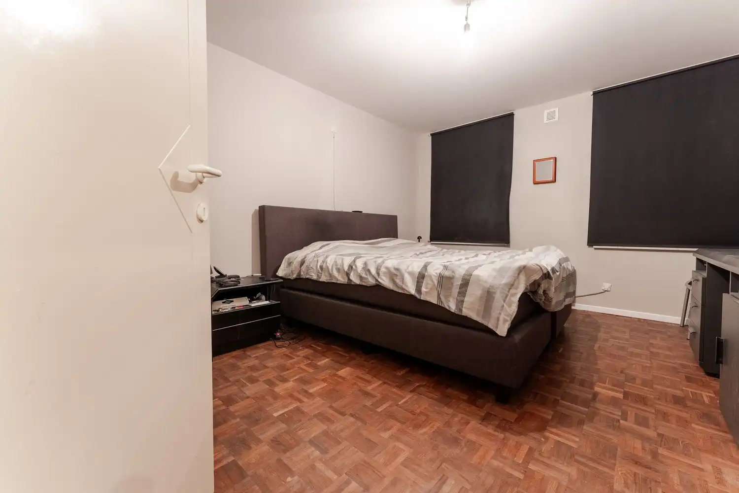 Ruim gelijkvloers appartement met 2 slaapkamers en garagebox nabij het centrum van Bree. foto 15