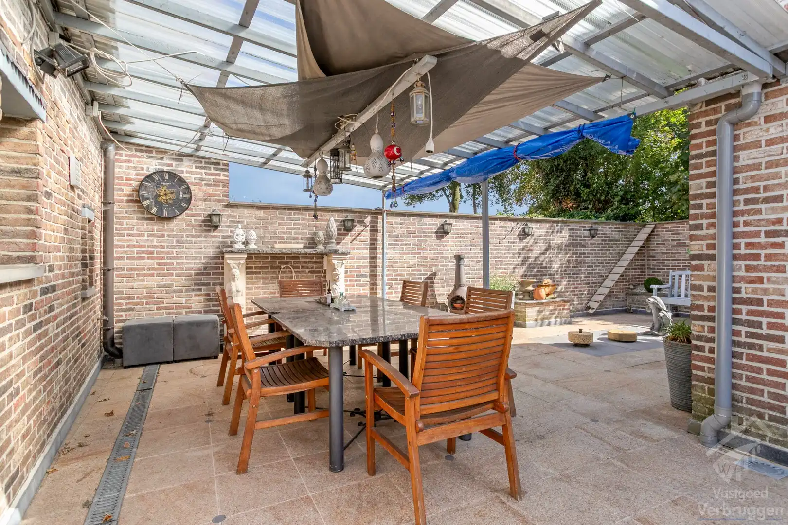 Sfeervolle instapklare woning met 2 slaapkamers, bureau,  garage en atelier foto 21
