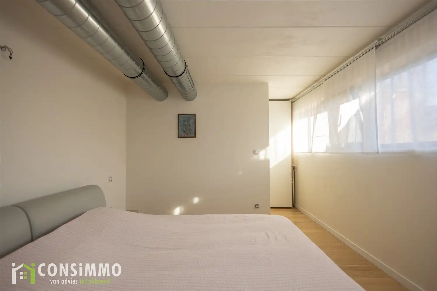 Unieke woning met industrieel-landelijke stijl in een rustige woonwijk van Genk foto 24