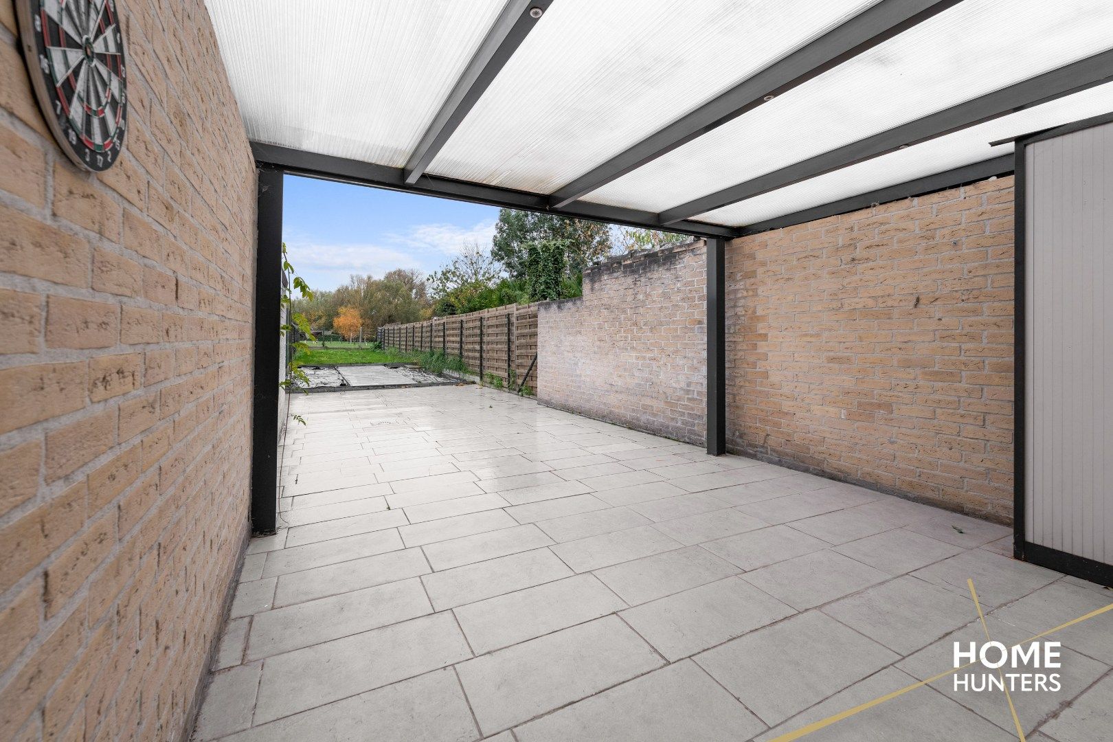 Charmante te renoveren rijwoning met 3 slaapkamers en diepe tuin op centrale ligging in Menen foto 22