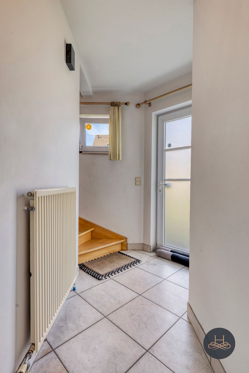 Gezellige halfopen bebouwing met 3 slaapkamers en leuke tuin foto 11