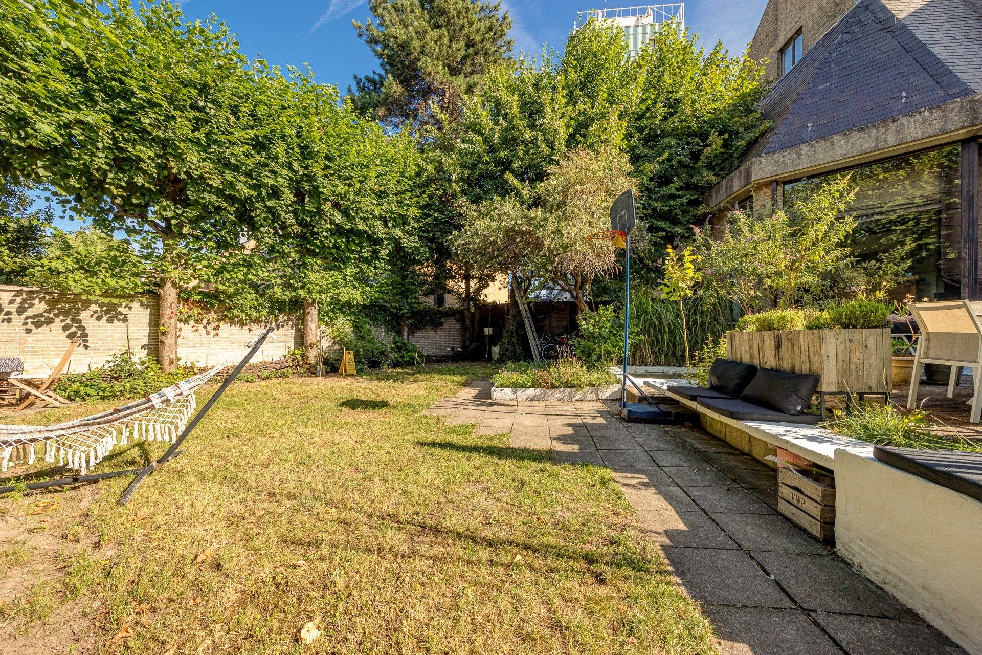 Unieke architectenwoning met tuin en polyvalente ruimte foto 27