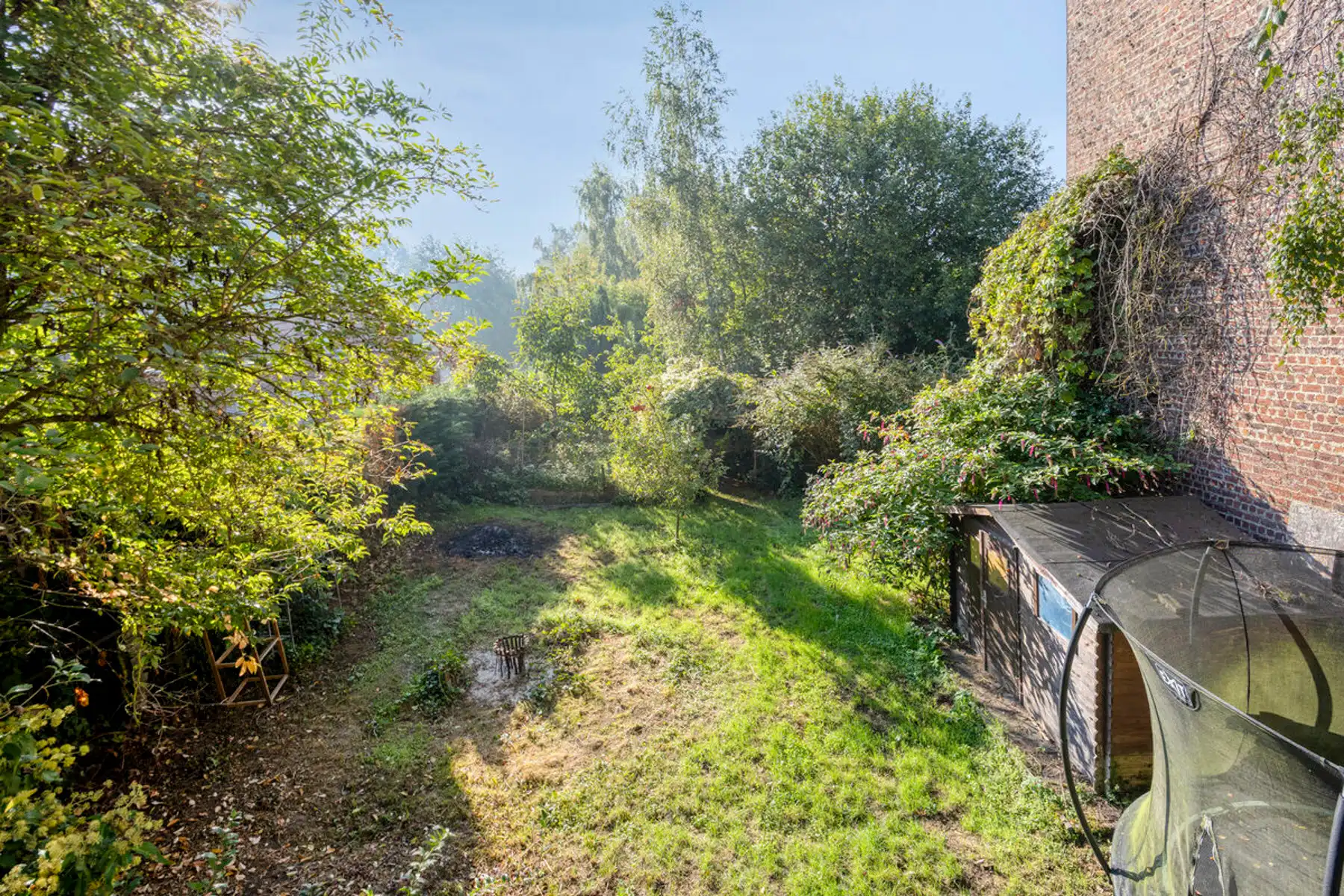Energetisch gerenoveerde woning met tuin uitgevend op Liedekerkebos foto 20