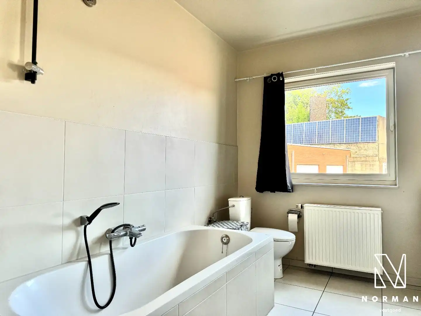 Gelijkvloers, instapklaar 2-slaapkamer appartement te koop met terras in centrum Bavikhove! foto 18