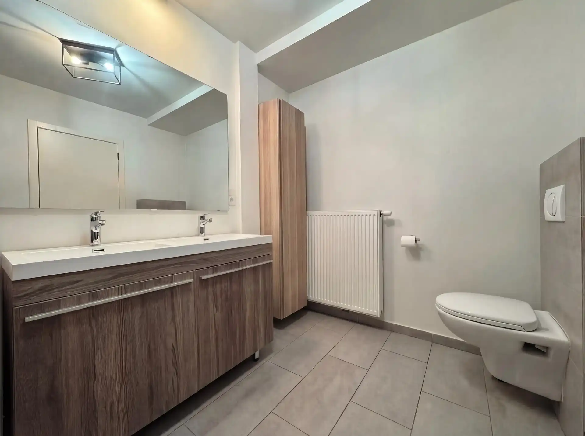 Prachtig gelijkvloers appartement met twee slaapkamers, tuin en garage foto 8