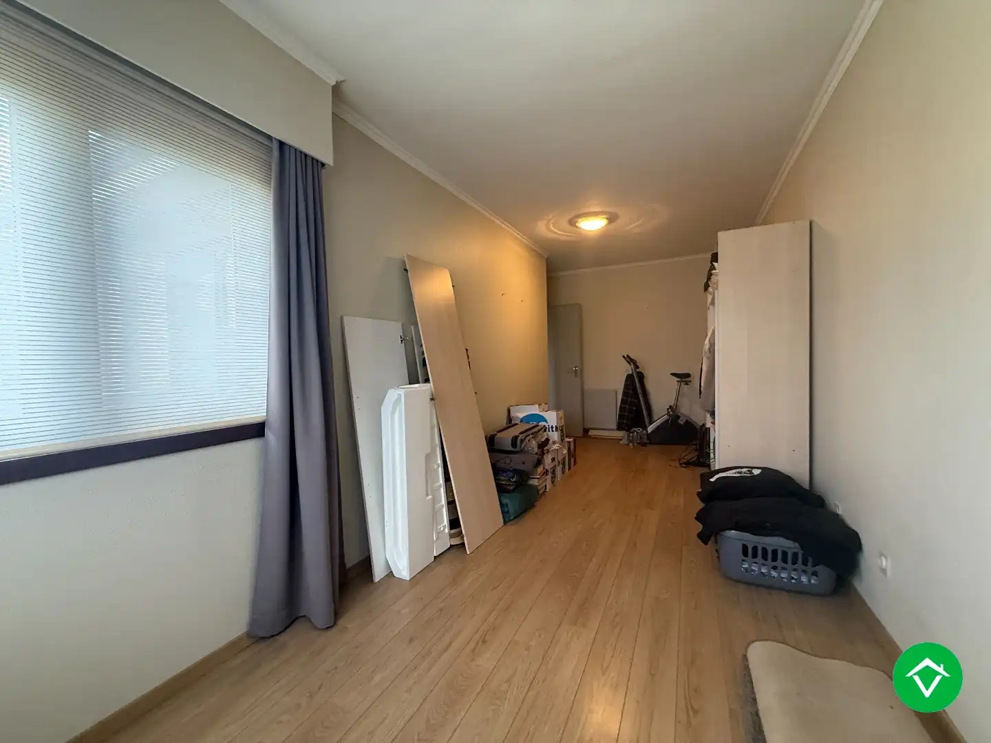 Rustig gelegen gelijkvloerse halfopen woning met 2 slpk's + dubbele garage foto 13