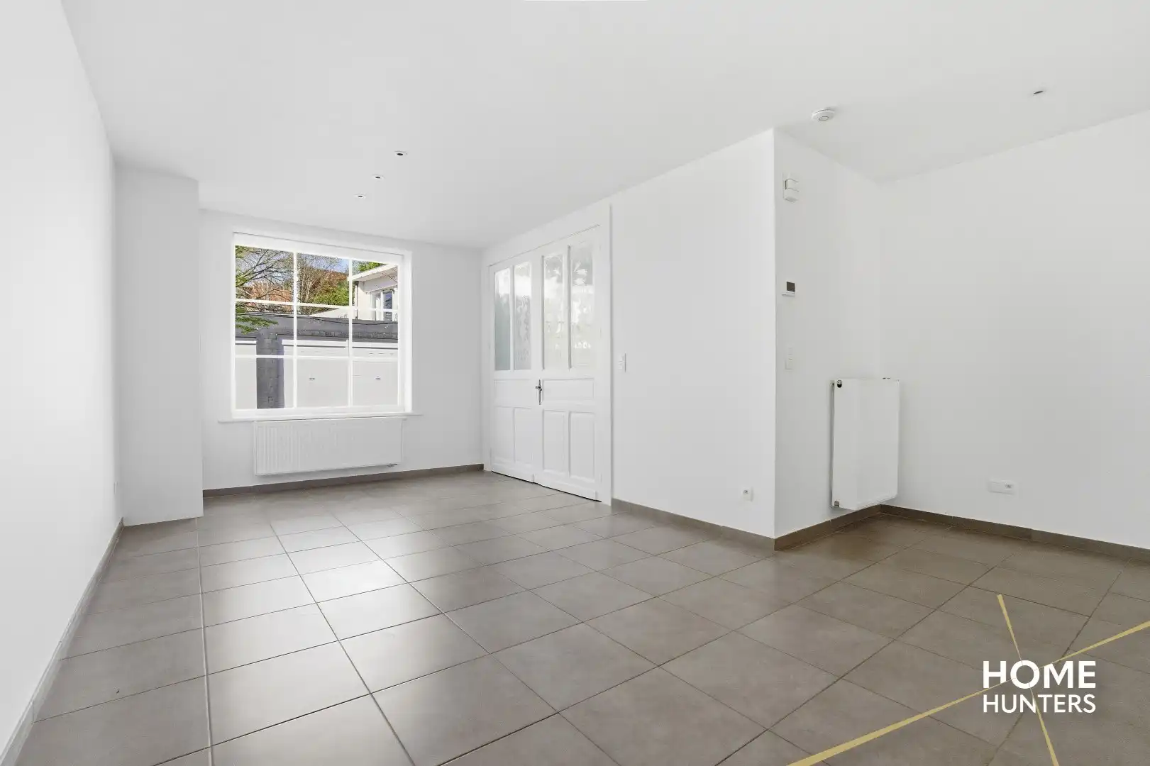 Charmante en instapklare woning met unieke stadskoer en garage foto 5