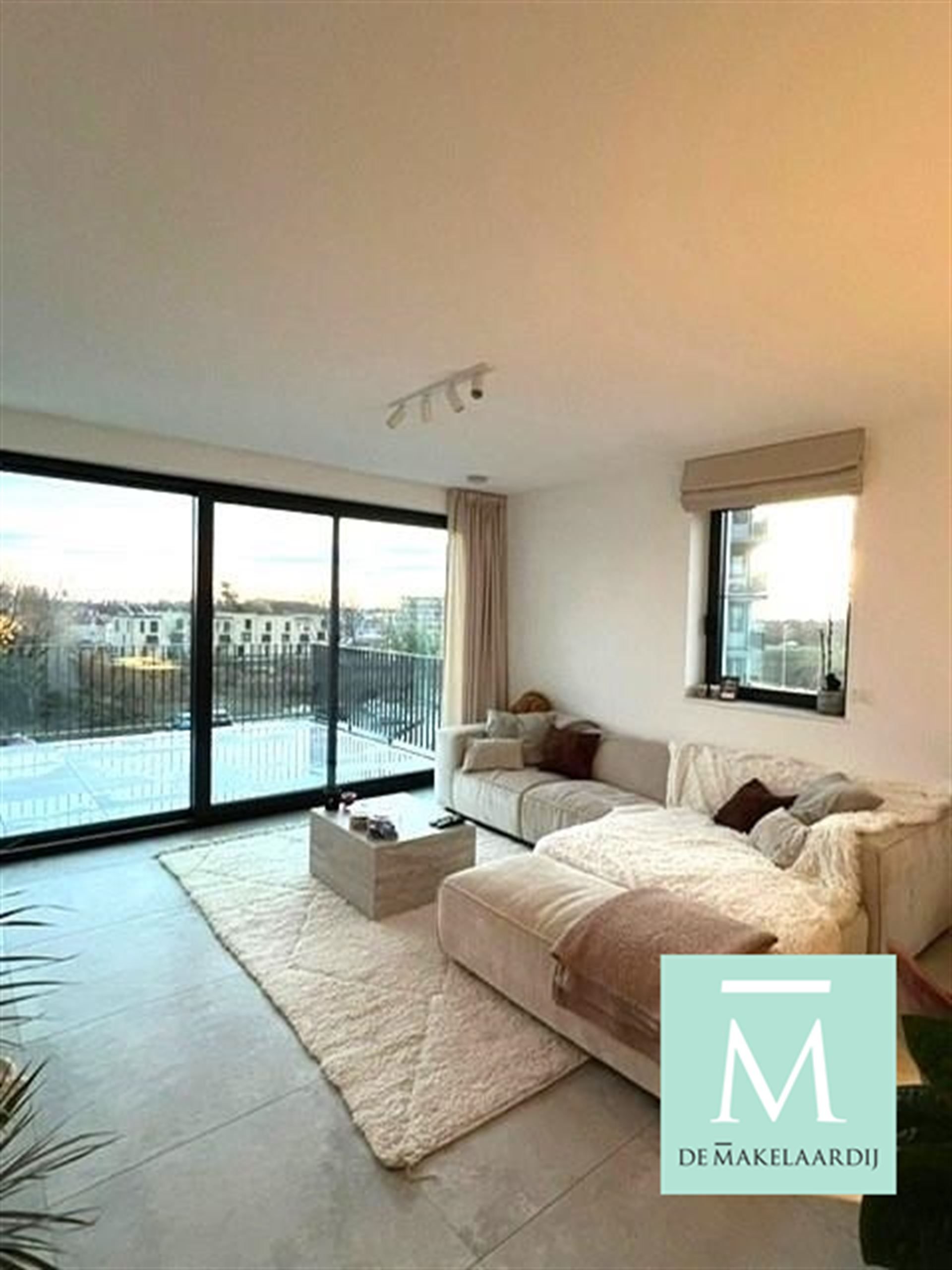 Super gezellig nieuwbouwappartement met 2 slaapkamers en groot terras op toplocatie! foto 4