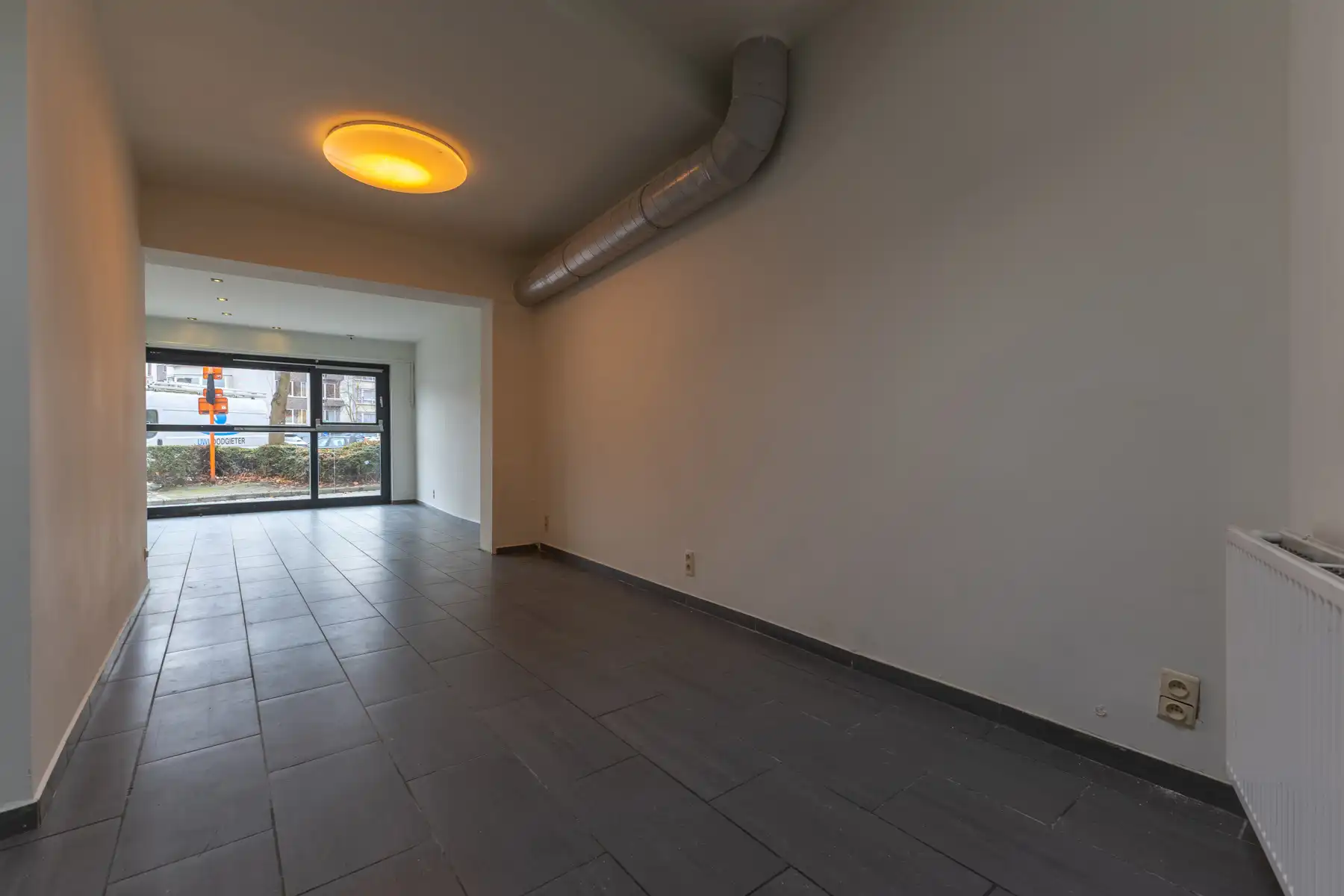 Commercieel gelijkvloers met duplex in centrum Halle foto 11